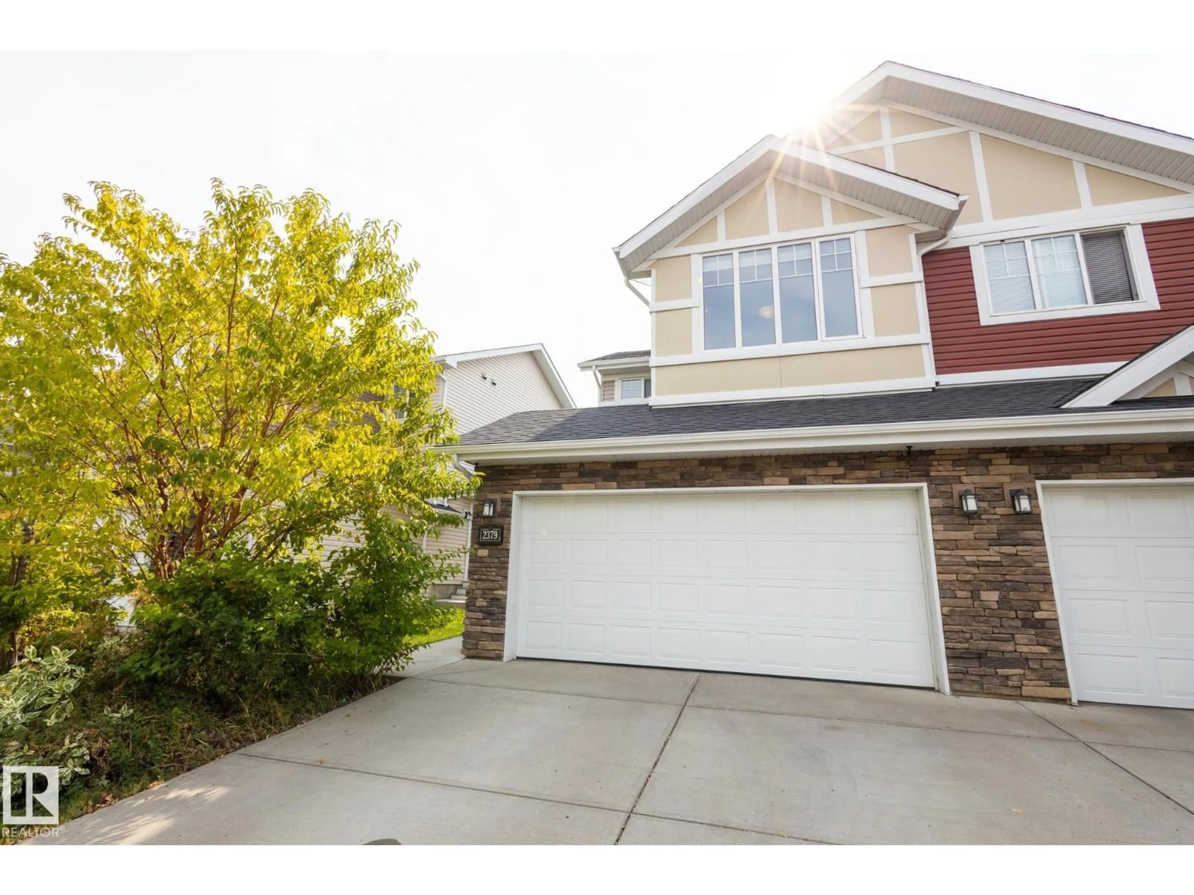 Home with vinyl exterior material, street for 2379 GLENRIDDING BV, Edmonton Alberta T6W2W7