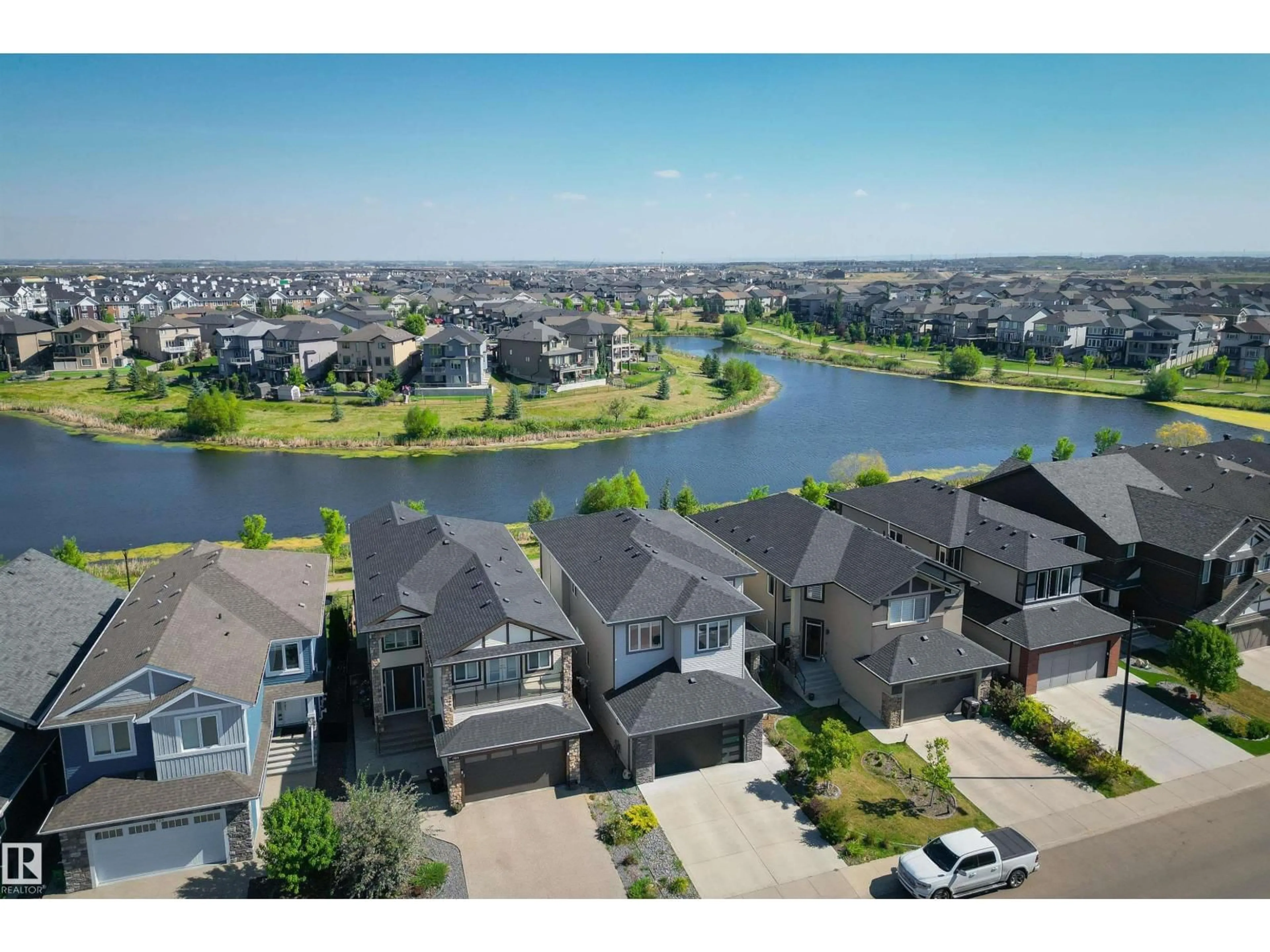 A pic from outside/outdoor area/front of a property/back of a property/a pic from drone, water/lake/river/ocean view for NW - 17831 78 ST, Edmonton Alberta T5Z0L7