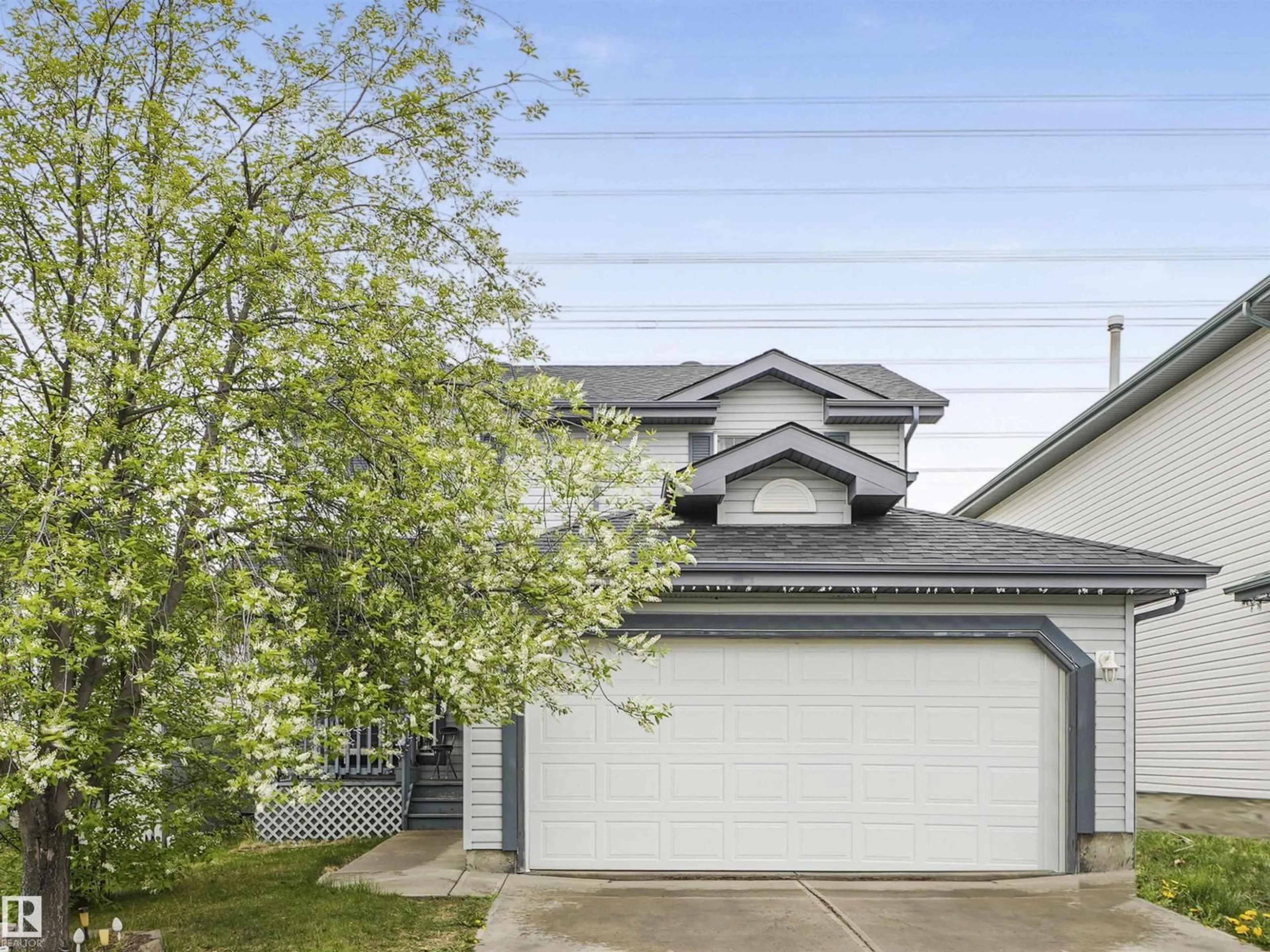 Home with vinyl exterior material, street for 3707 28 ST, Edmonton Alberta T6T1N3