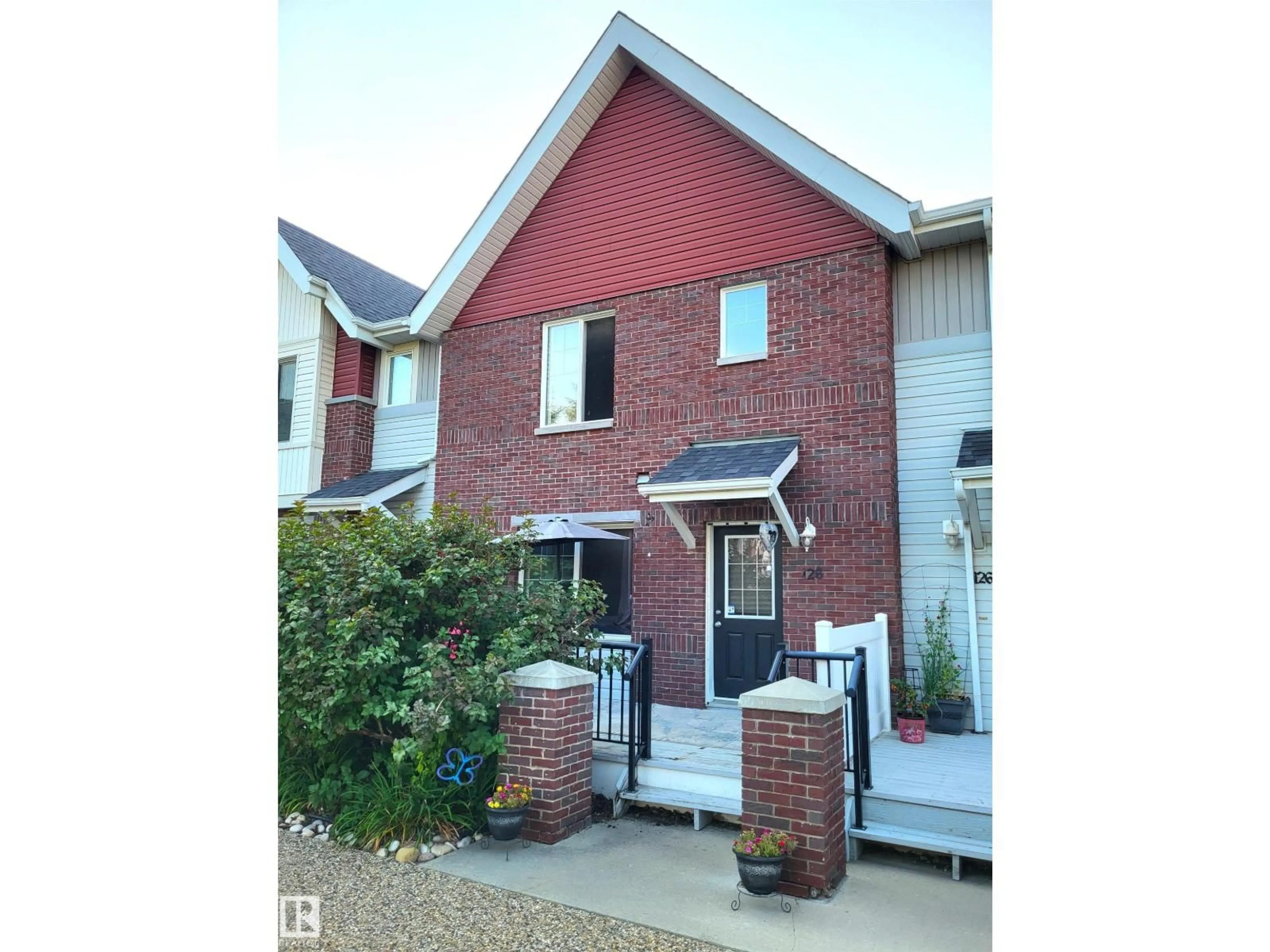Home with brick exterior material, street for 128 2336 ASPEN TR, Sherwood Park Alberta T8H0J1