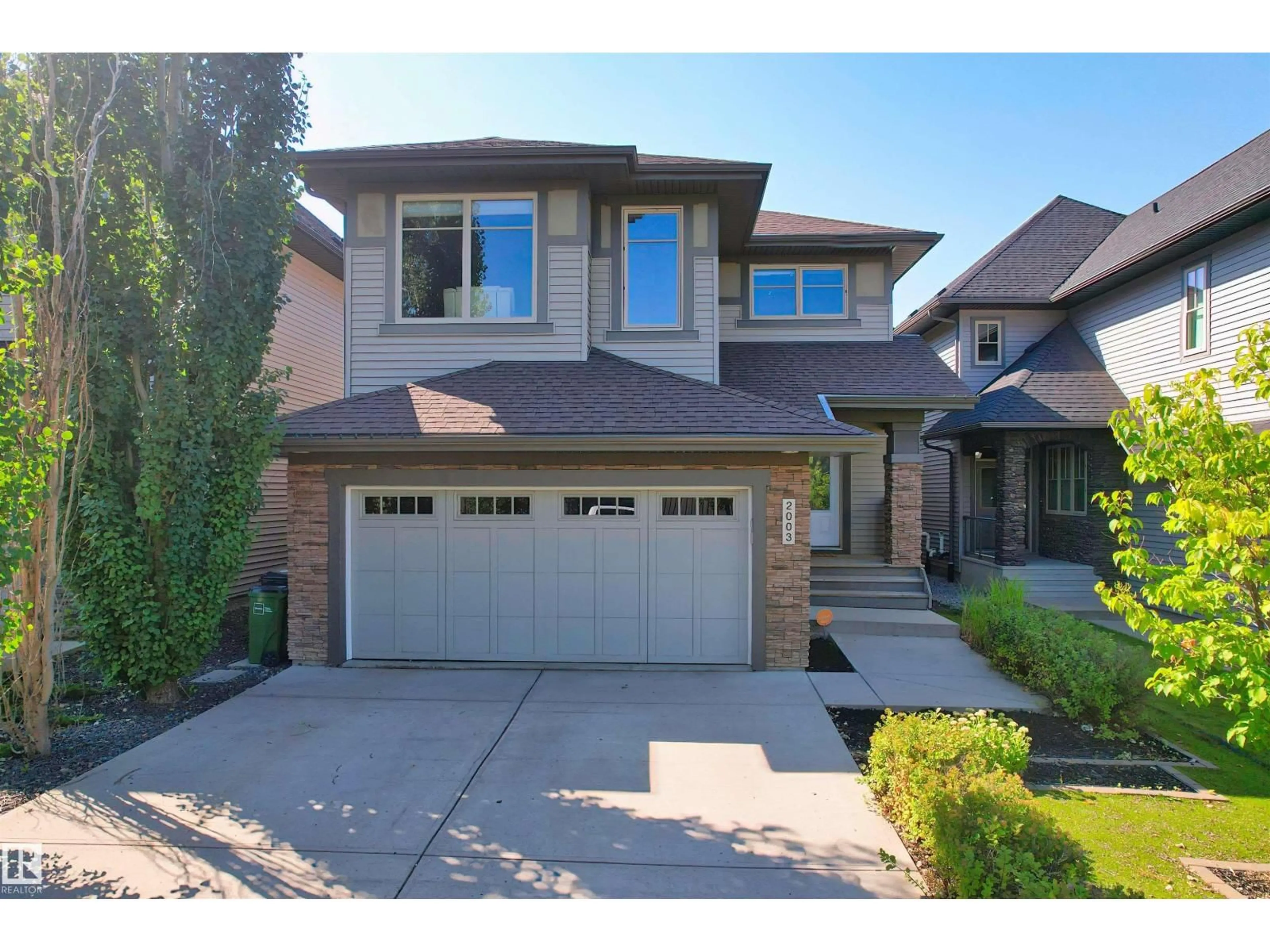 Home with brick exterior material, street for LI SW - 2003 AINSLIE LINK, Edmonton Alberta T6W2M1