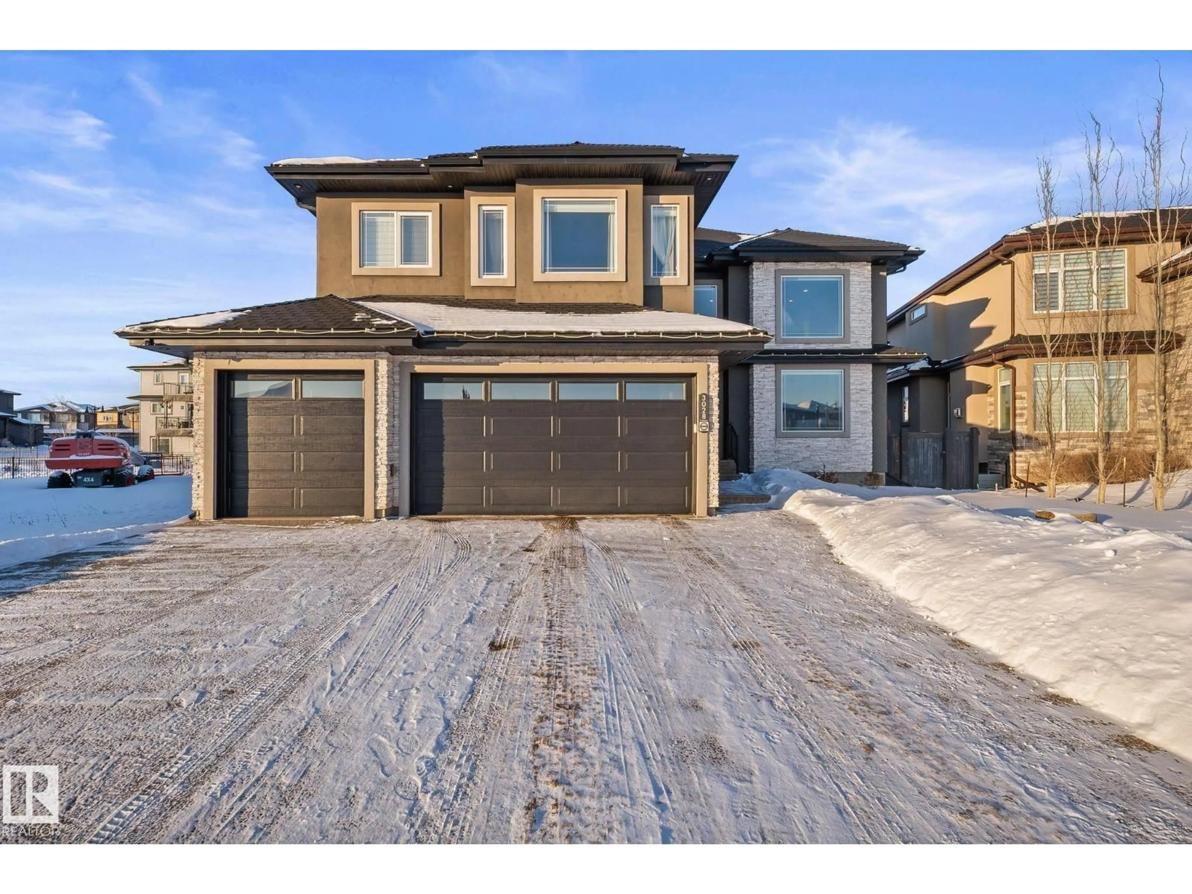 Home with brick exterior material, street for 3028 59 AV, Rural Leduc County Alberta T4X0X9