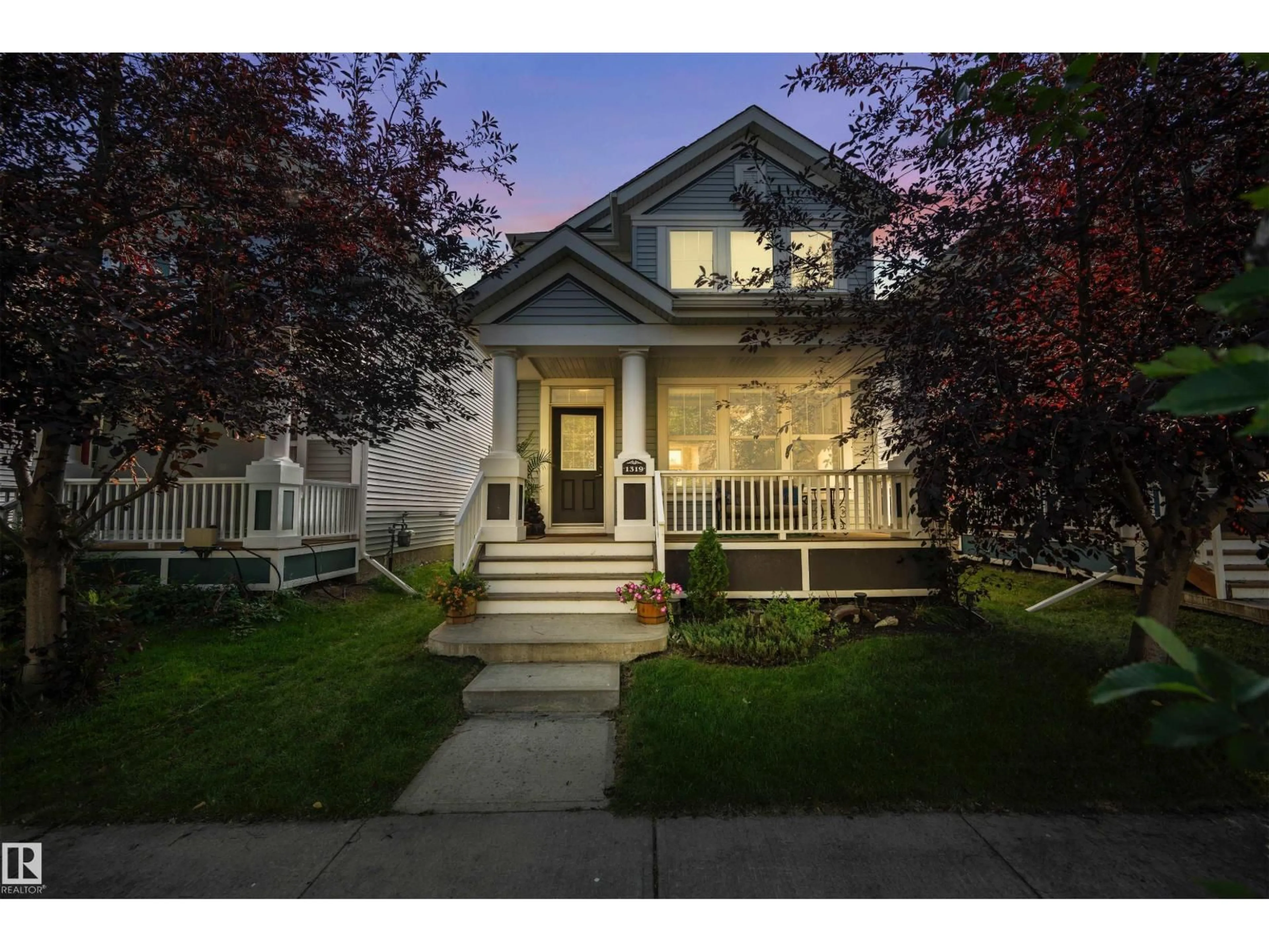 Home with vinyl exterior material, street for 1319 74 ST, Edmonton Alberta T6X0H1