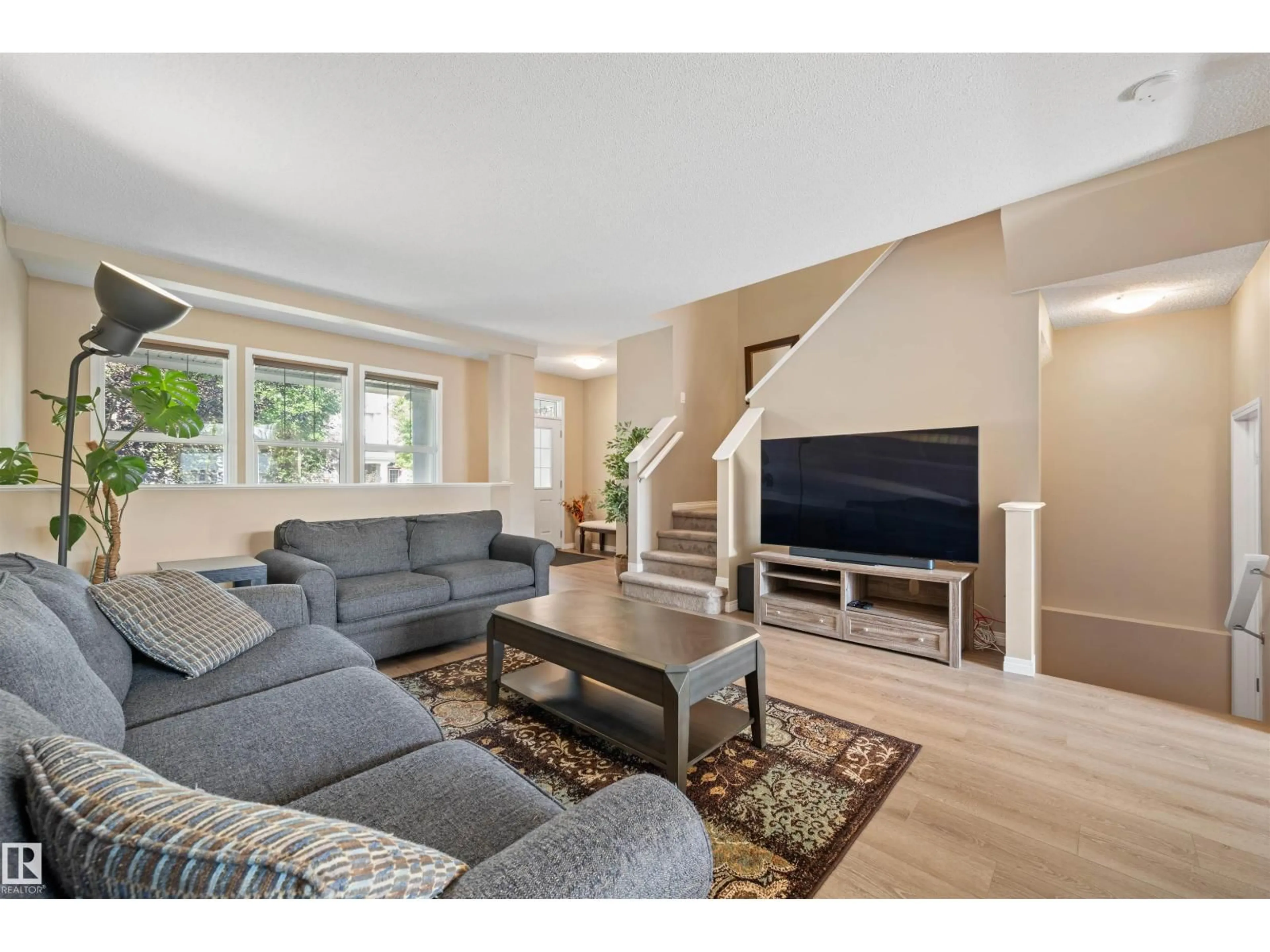 Living room with furniture, unknown for 1319 74 ST, Edmonton Alberta T6X0H1