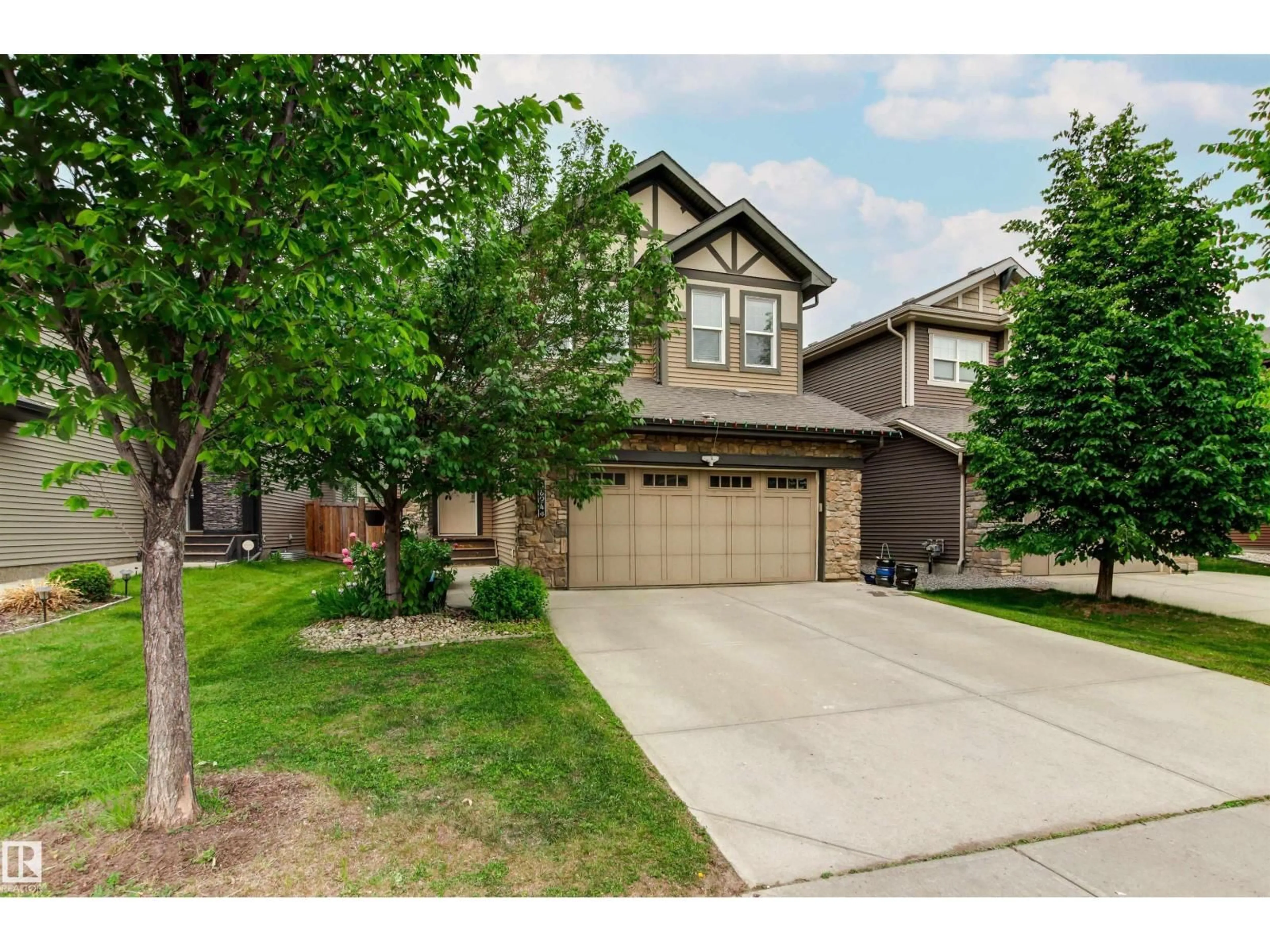 A pic from outside/outdoor area/front of a property/back of a property/a pic from drone, street for NW - 8804 217 ST, Edmonton Alberta T5T4R4