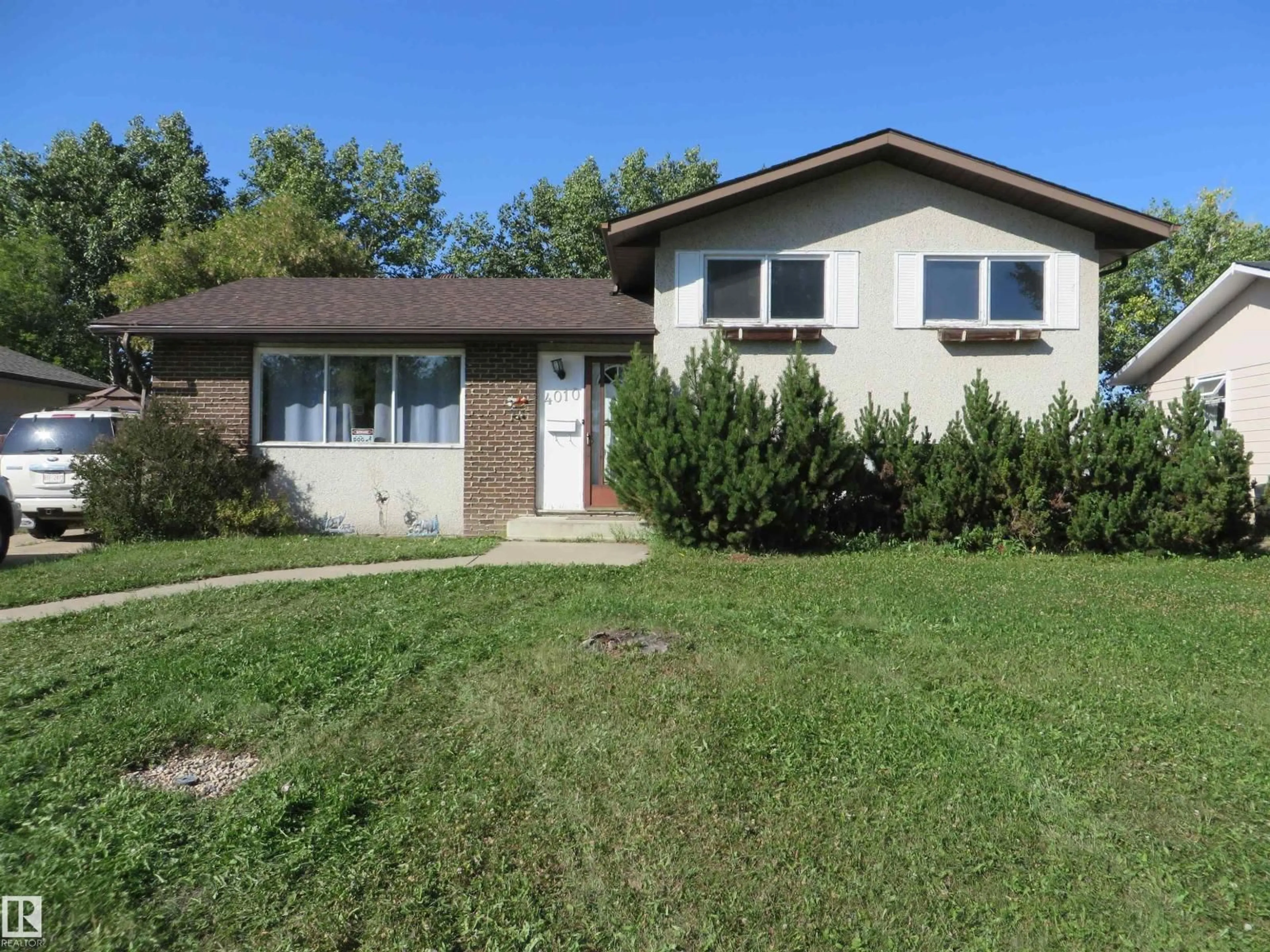 Home with vinyl exterior material, street for 4010 37 AV, Leduc Alberta T9E6E1