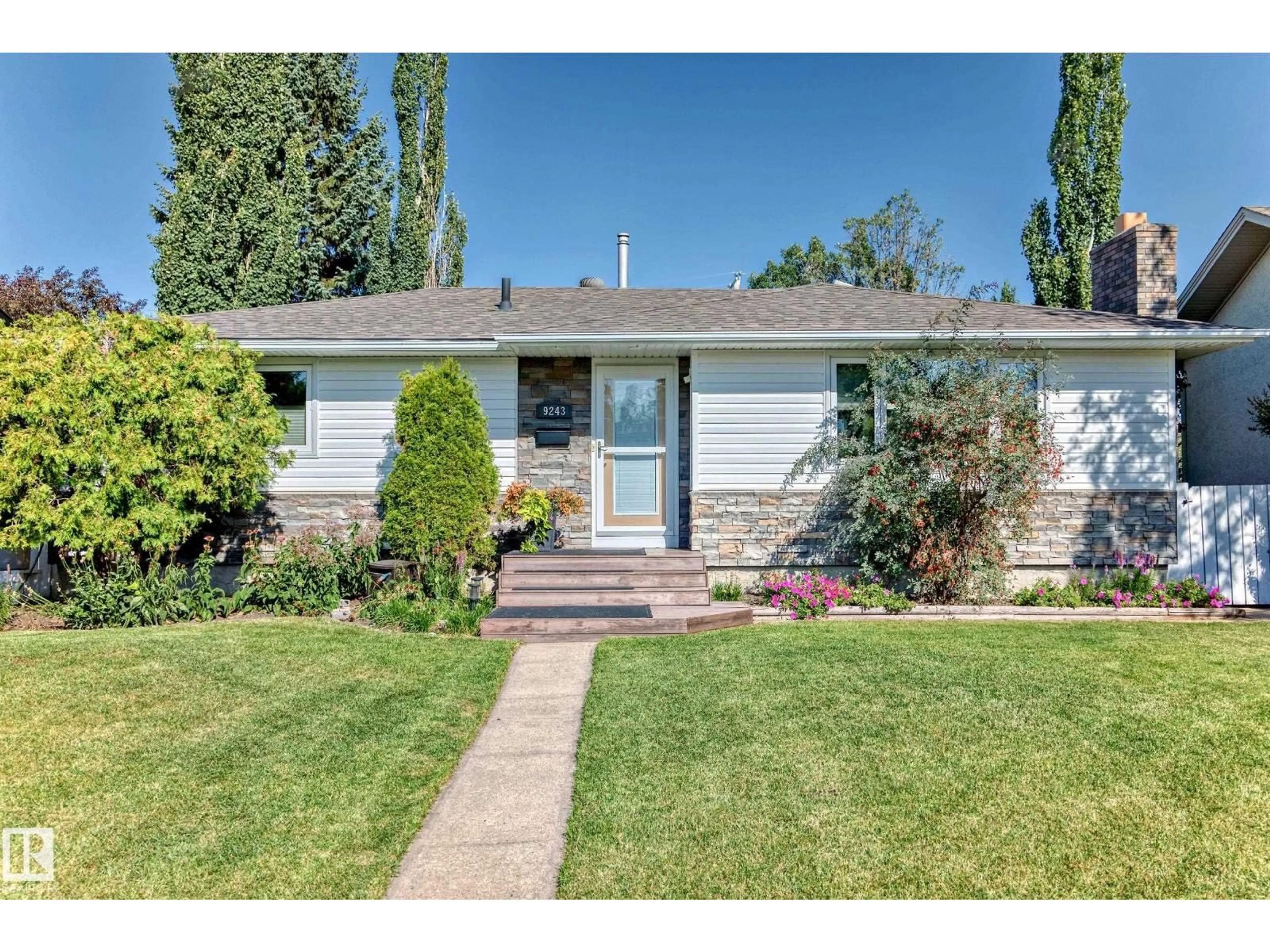 Home with vinyl exterior material, street for NW - 9243 69A ST, Edmonton Alberta T6B1W1