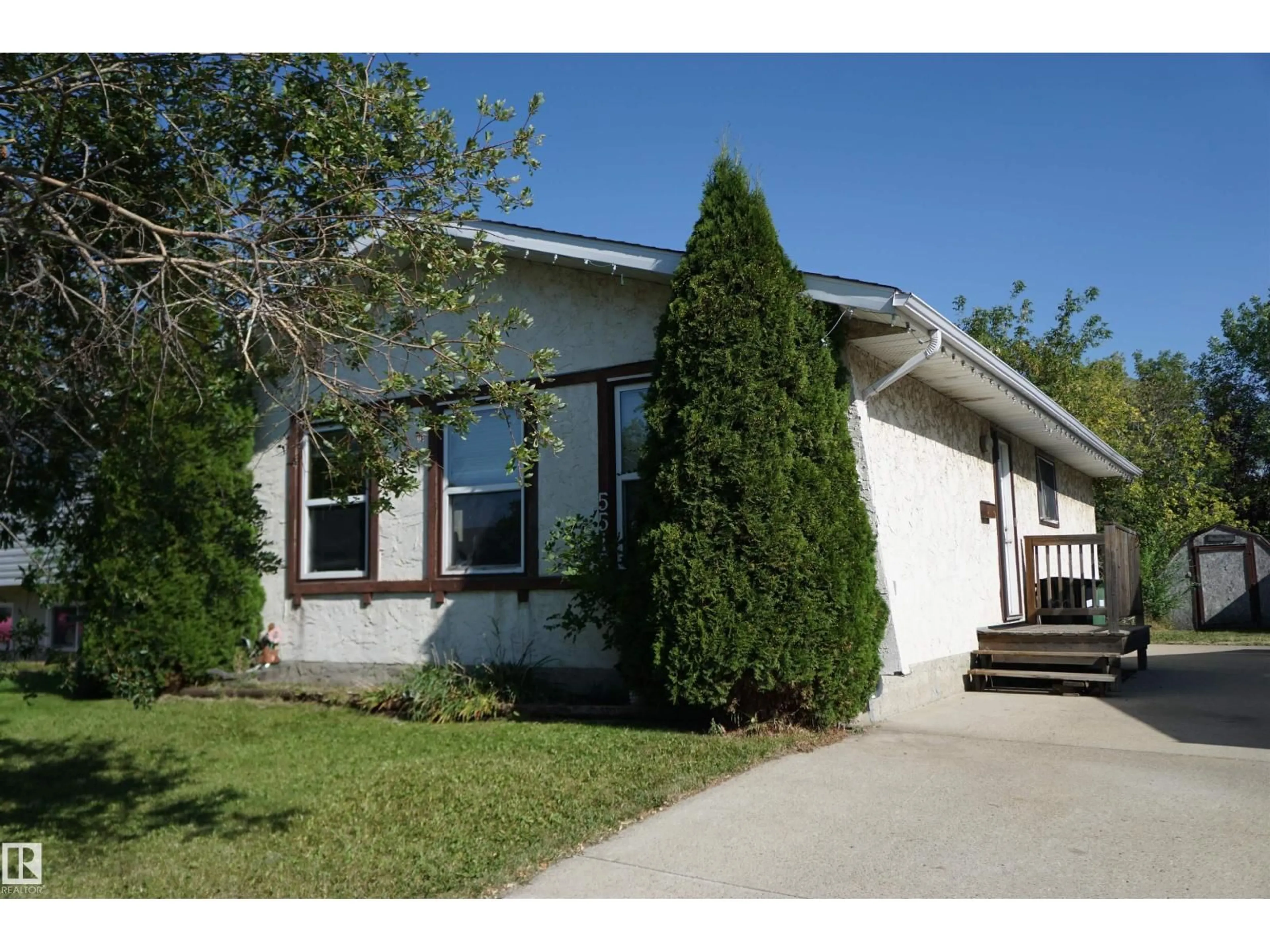 Home with vinyl exterior material, street for 5515 54 ST, Leduc Alberta T9E5P4