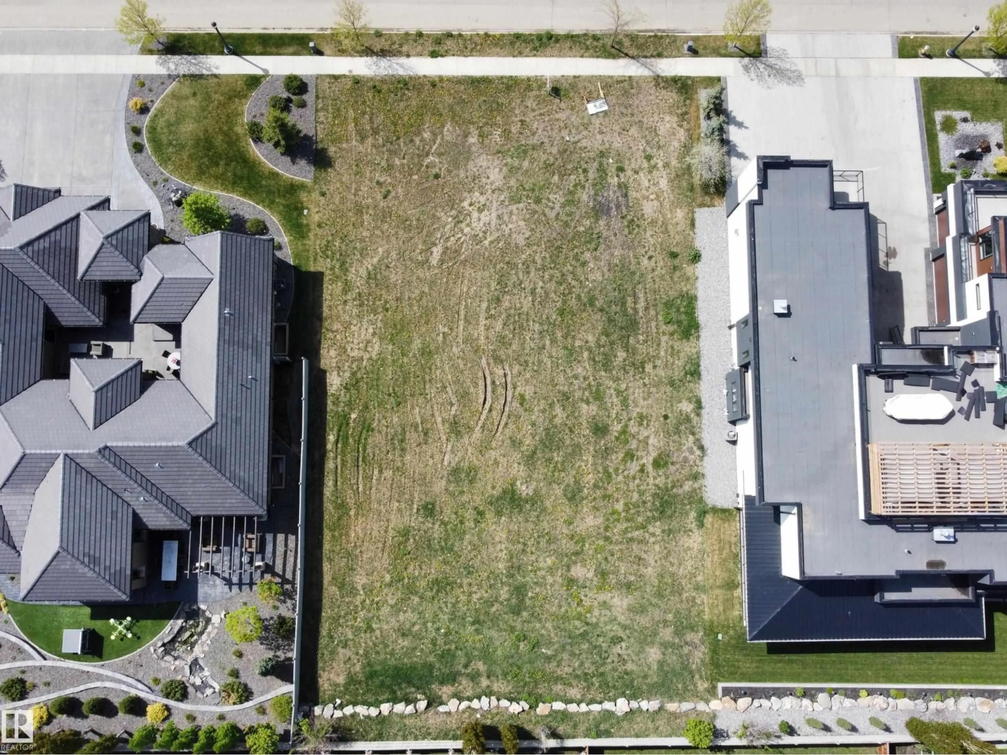 A pic from outside/outdoor area/front of a property/back of a property/a pic from drone, street for 21 WINDERMERE DR, Edmonton Alberta T6W0S2