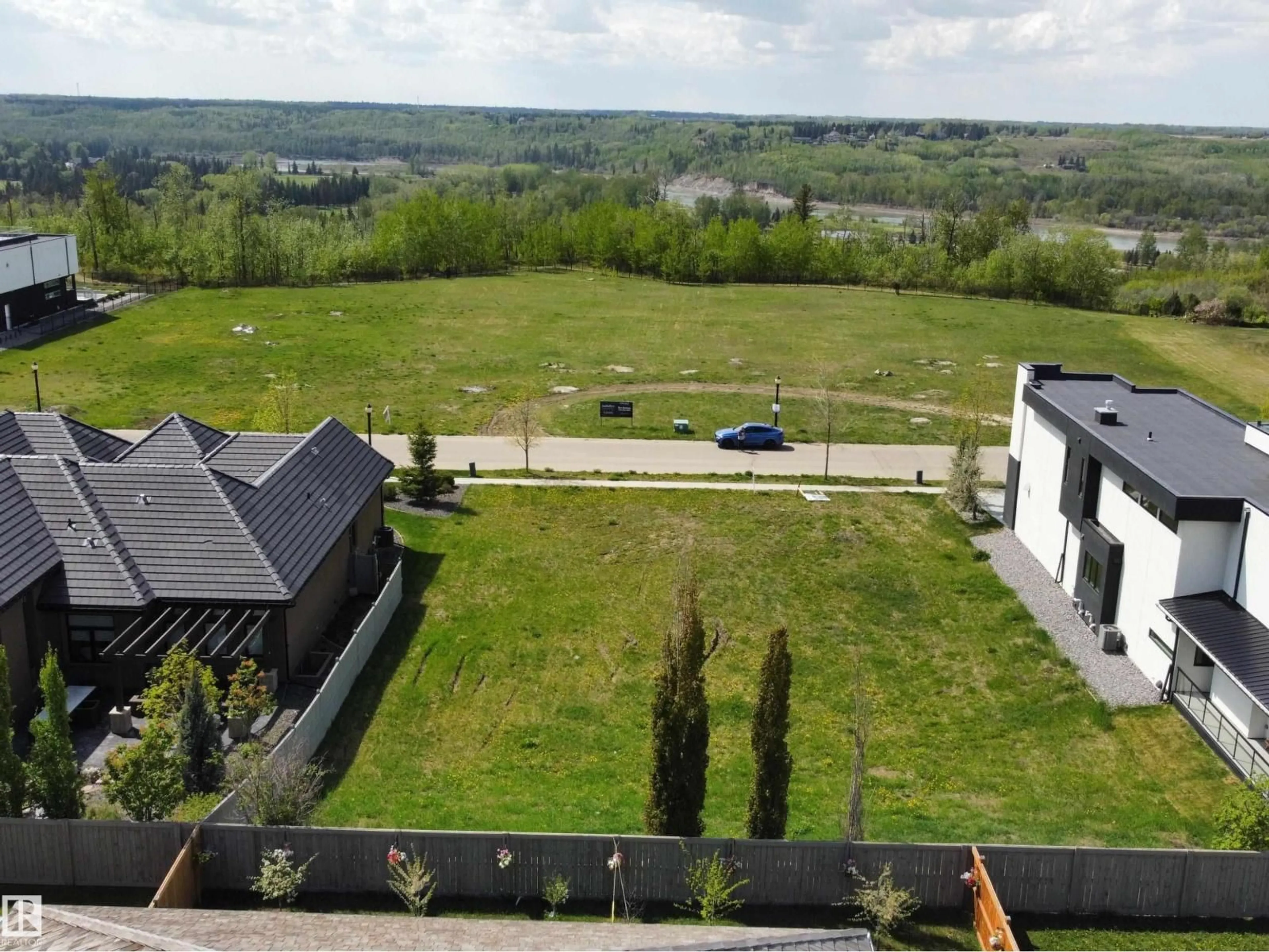 A pic from outside/outdoor area/front of a property/back of a property/a pic from drone, unknown for 21 WINDERMERE DR, Edmonton Alberta T6W0S2