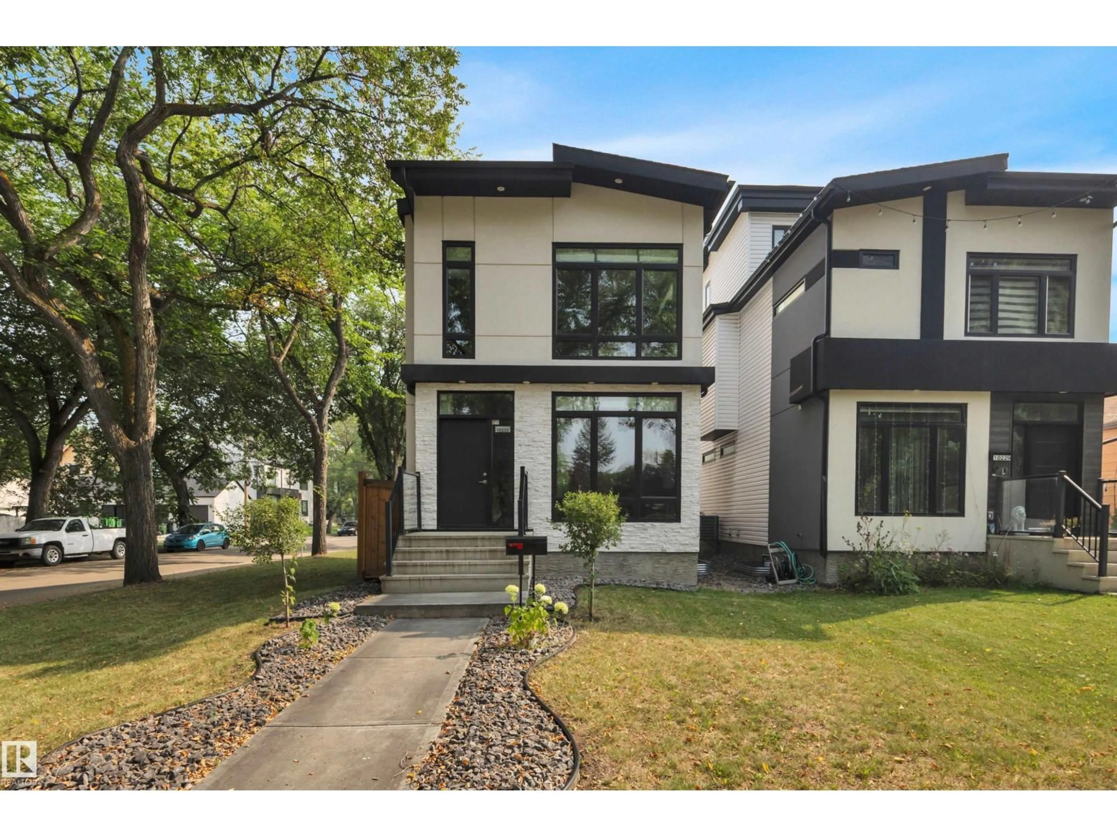 Home with vinyl exterior material, street for NW - 10233 139 ST, Edmonton Alberta T5N3R2