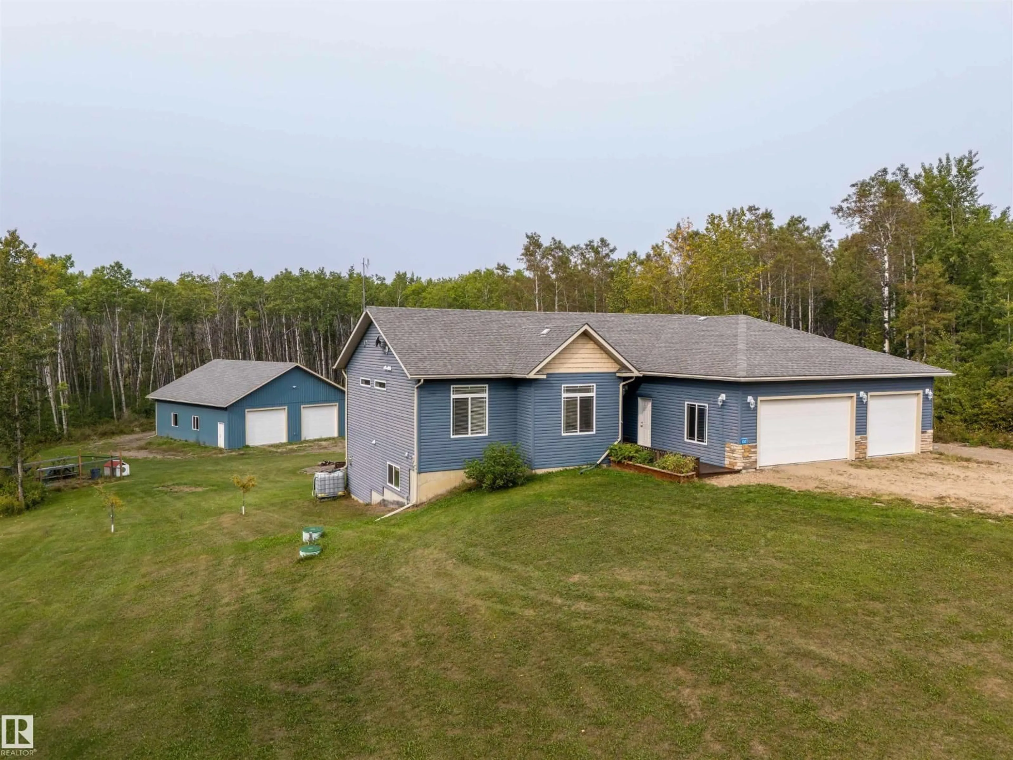 A pic from outside/outdoor area/front of a property/back of a property/a pic from drone, unknown for 102 - 62212 RANGE ROAD 412, Rural Bonnyville M.D. Alberta T0A0T0