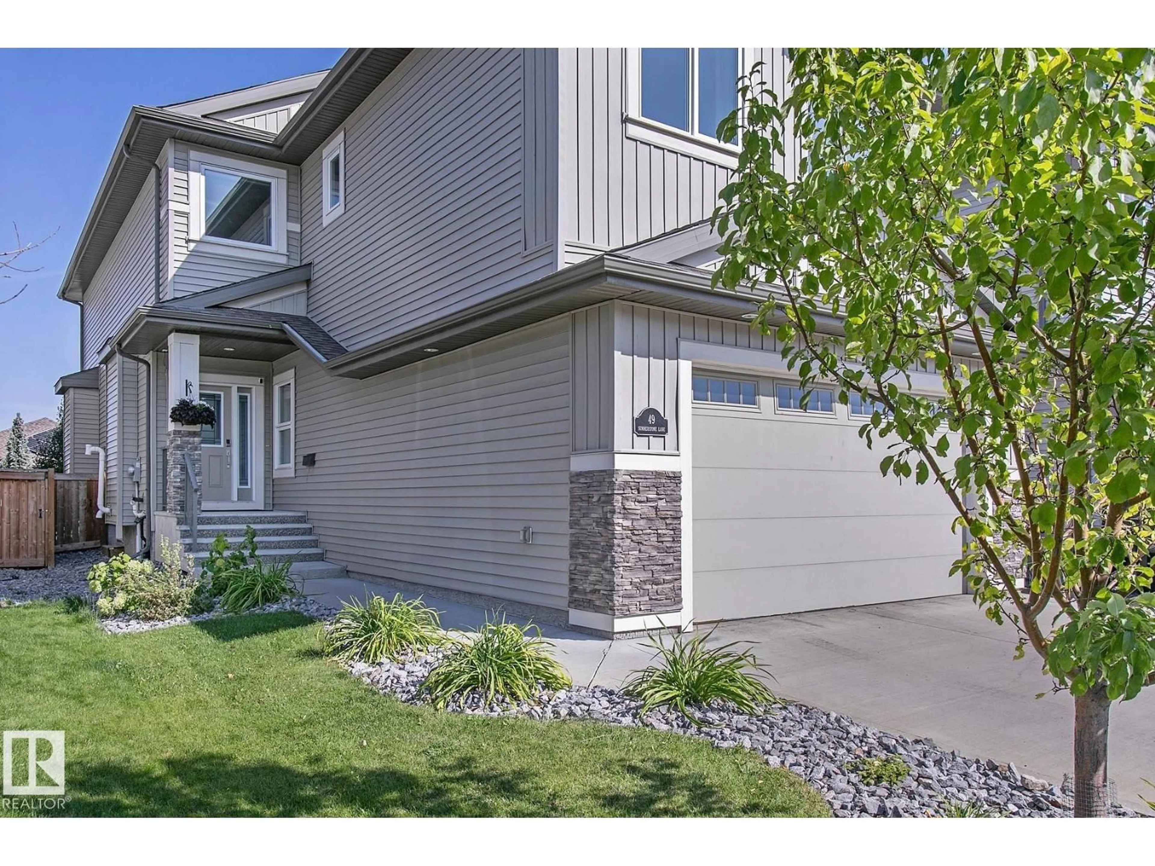 Home with vinyl exterior material, street for 49 SUMMERSTONE LN, Sherwood Park Alberta T8H0Y4