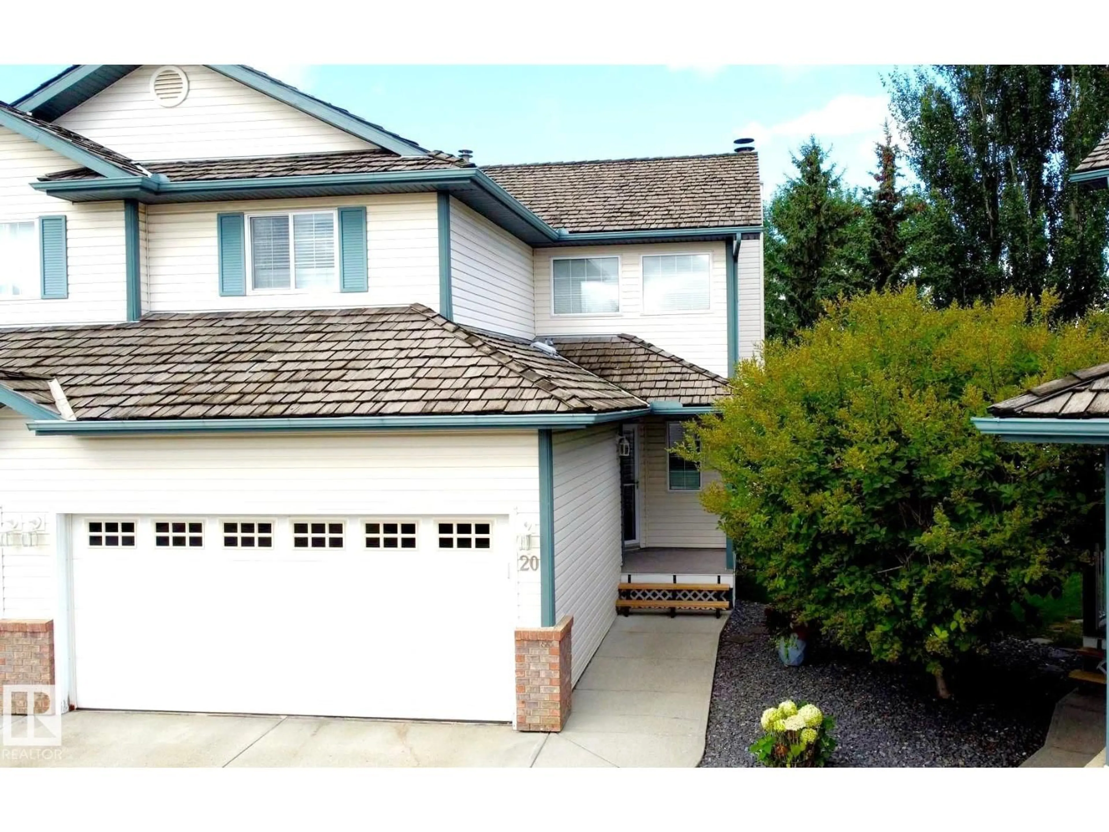 Home with vinyl exterior material, street for 20 211 BLACKBURN E SW, Edmonton Alberta T6W1C8