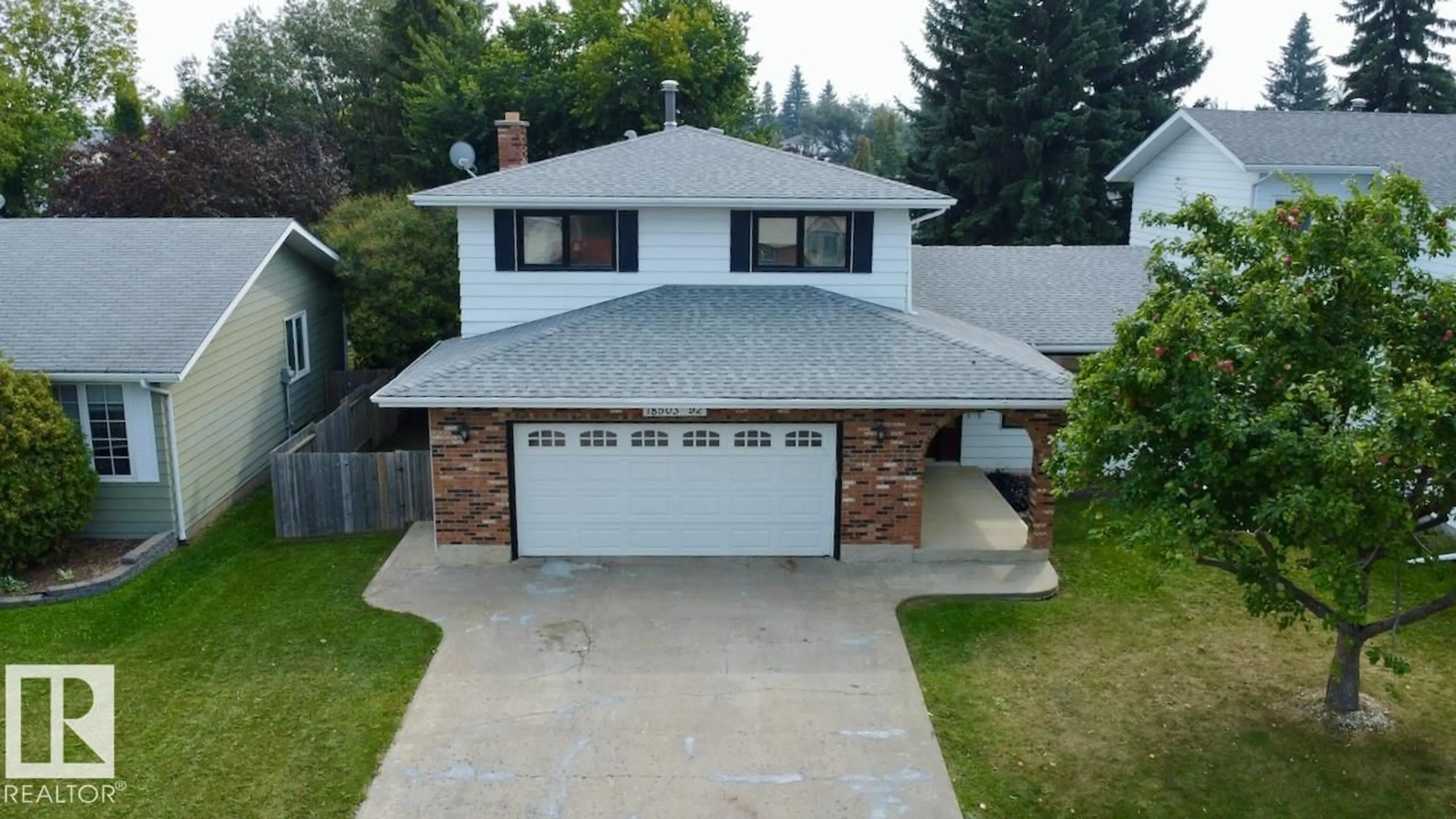 A pic from outside/outdoor area/front of a property/back of a property/a pic from drone, street for 18503 92 AV, Edmonton Alberta T5T1P2
