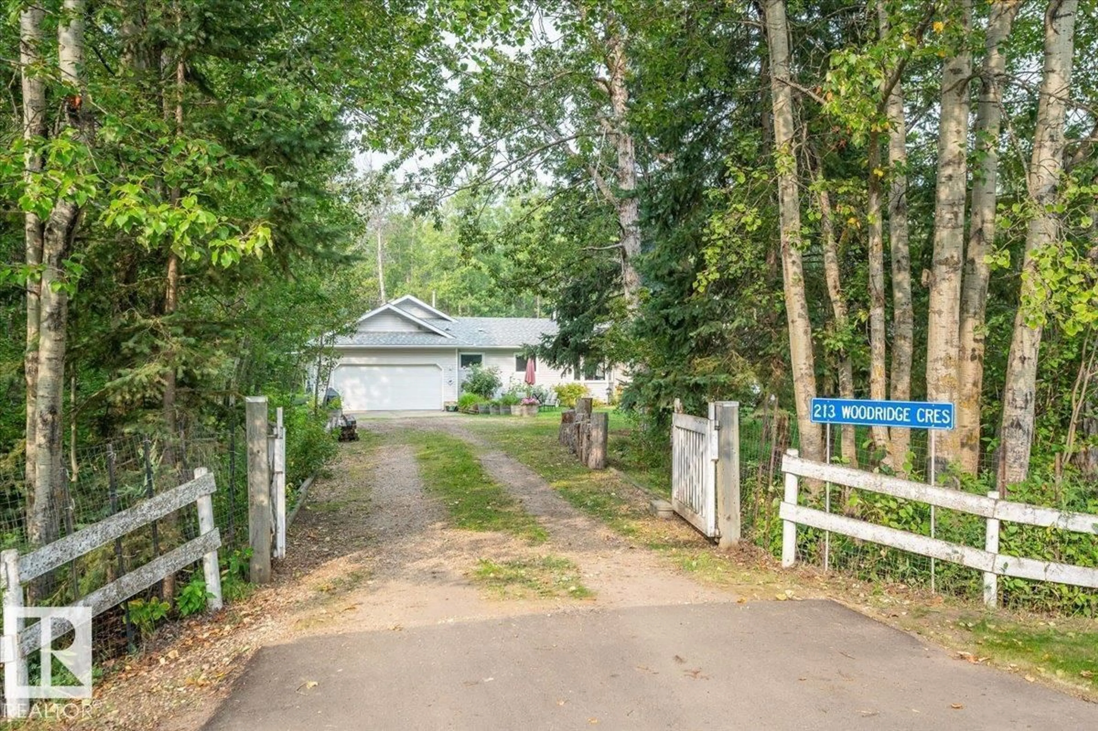 A pic from outside/outdoor area/front of a property/back of a property/a pic from drone, unknown for #213 - 57303 RGE ROAD 233, Rural Sturgeon County Alberta T0A1N0