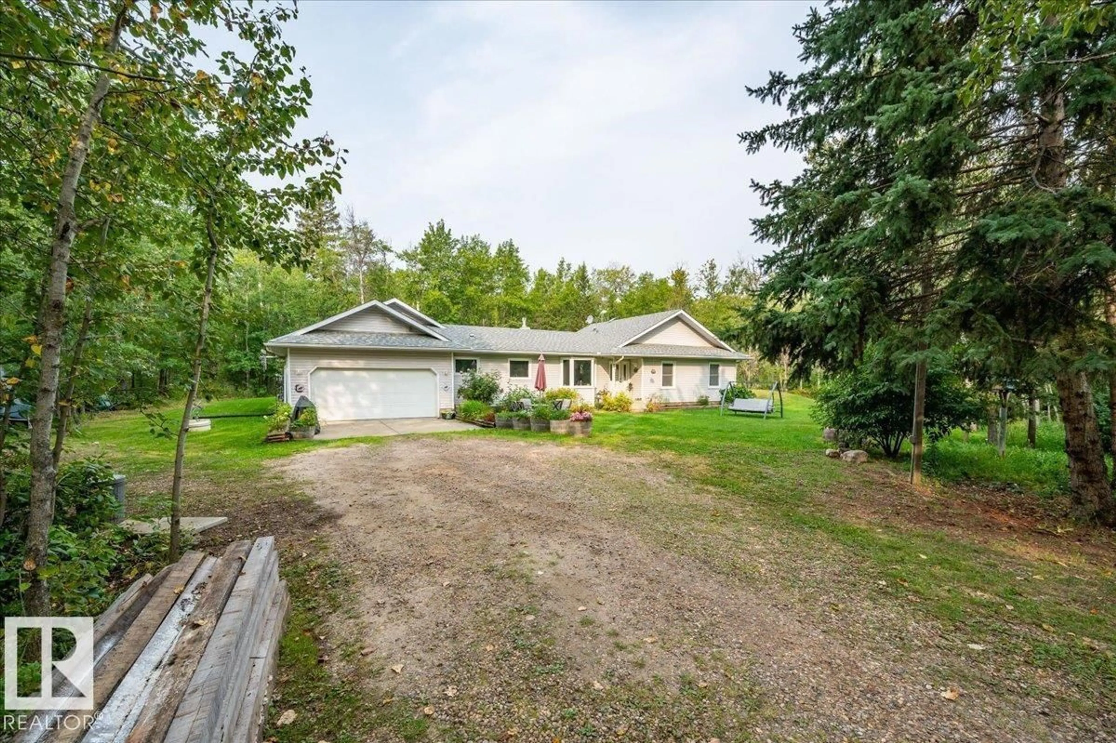 A pic from outside/outdoor area/front of a property/back of a property/a pic from drone, street for #213 - 57303 RGE ROAD 233, Rural Sturgeon County Alberta T0A1N0