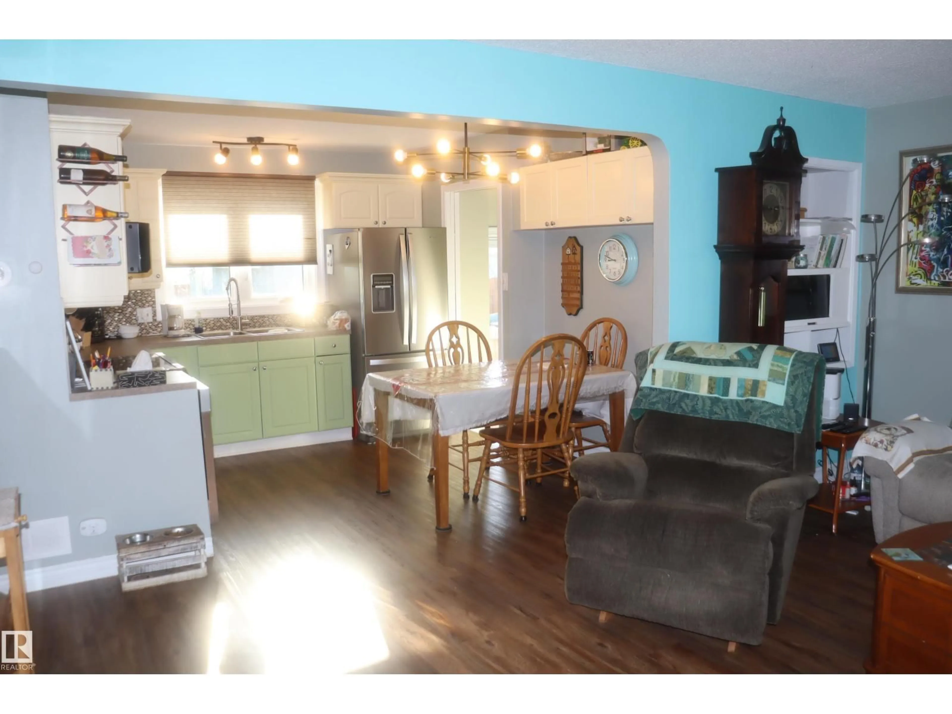 Open concept kitchen, wood/laminate floor for 4023 52 ST, Wetaskiwin Alberta T9A1N1