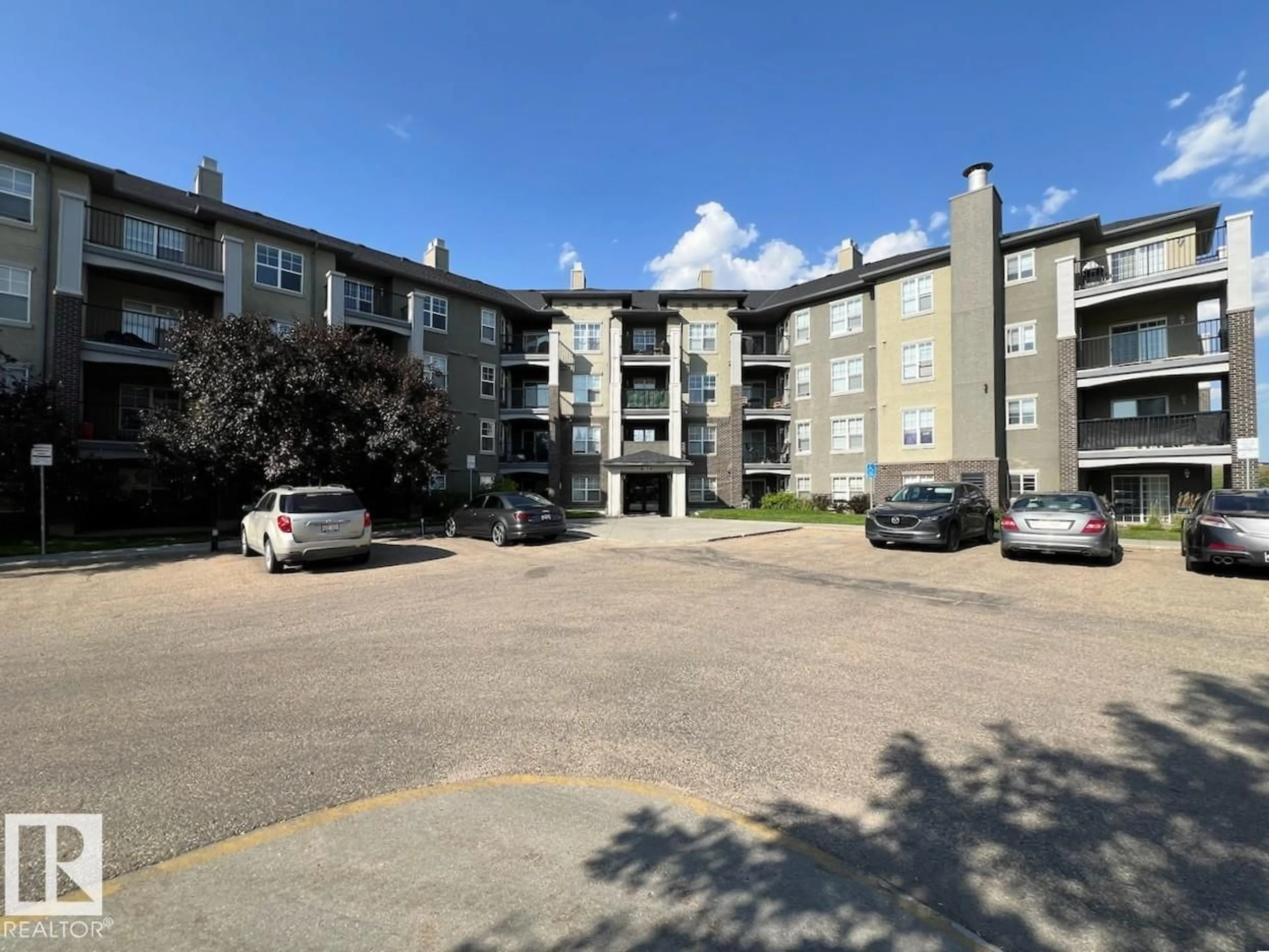 A pic from outside/outdoor area/front of a property/back of a property/a pic from drone, building for #409 - 636 MCALLISTER LO, Edmonton Alberta T6W1N4