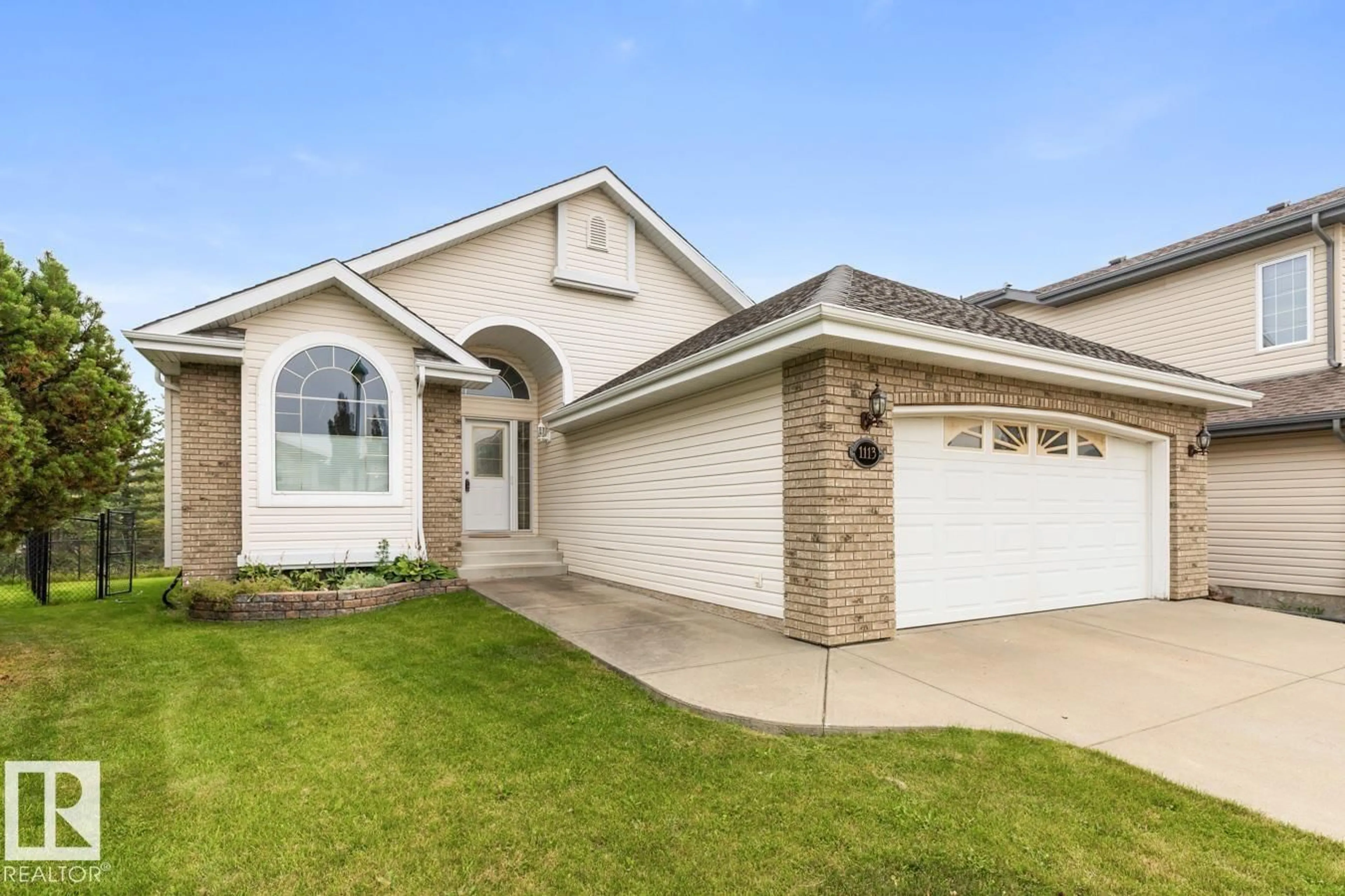 Home with vinyl exterior material, street for 1113 HAYNES CL, Edmonton Alberta T6S1A2