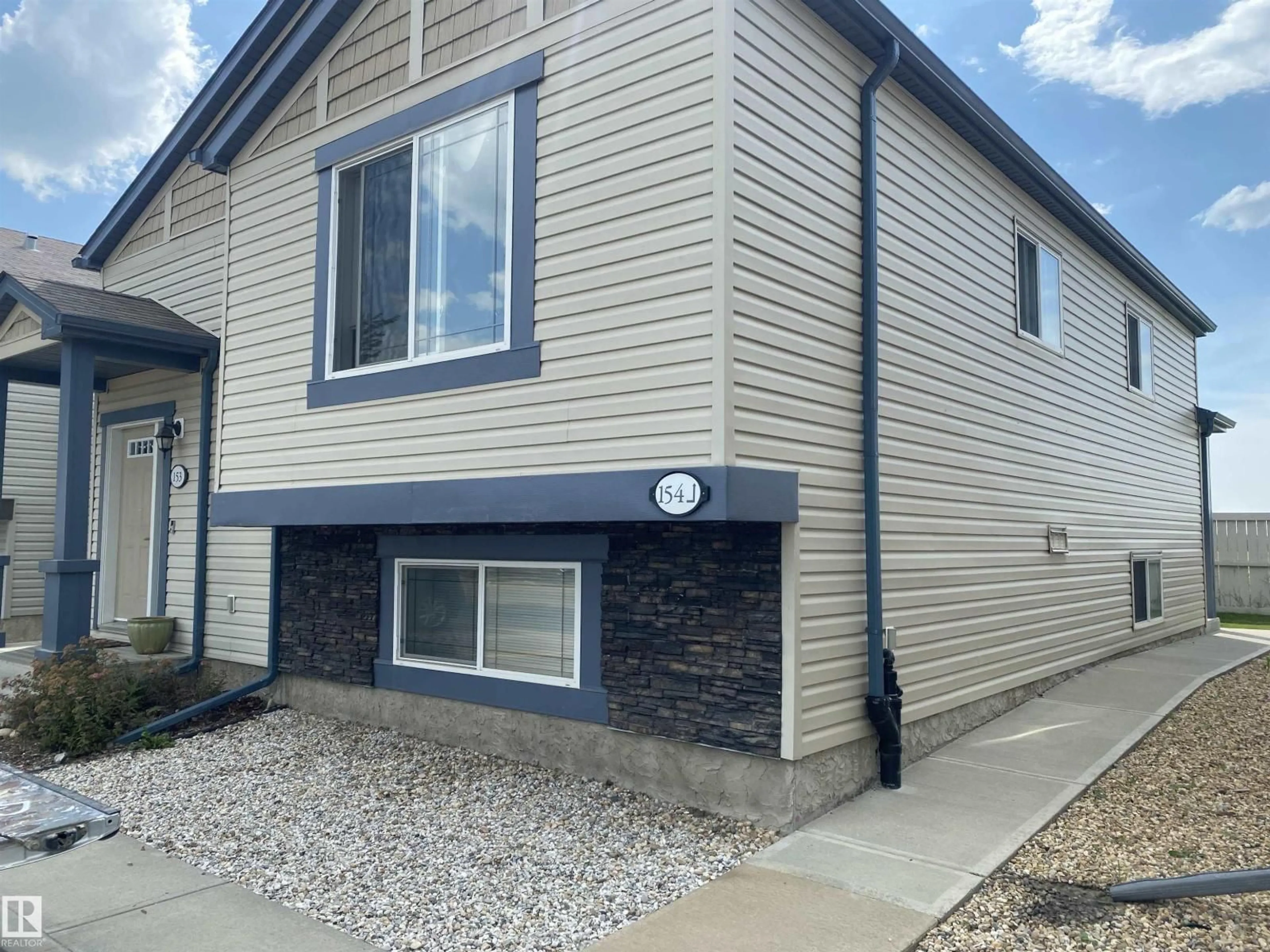 Home with vinyl exterior material, street for 142 - 154 SELKIRK PLACE, Leduc Alberta T9E0M9