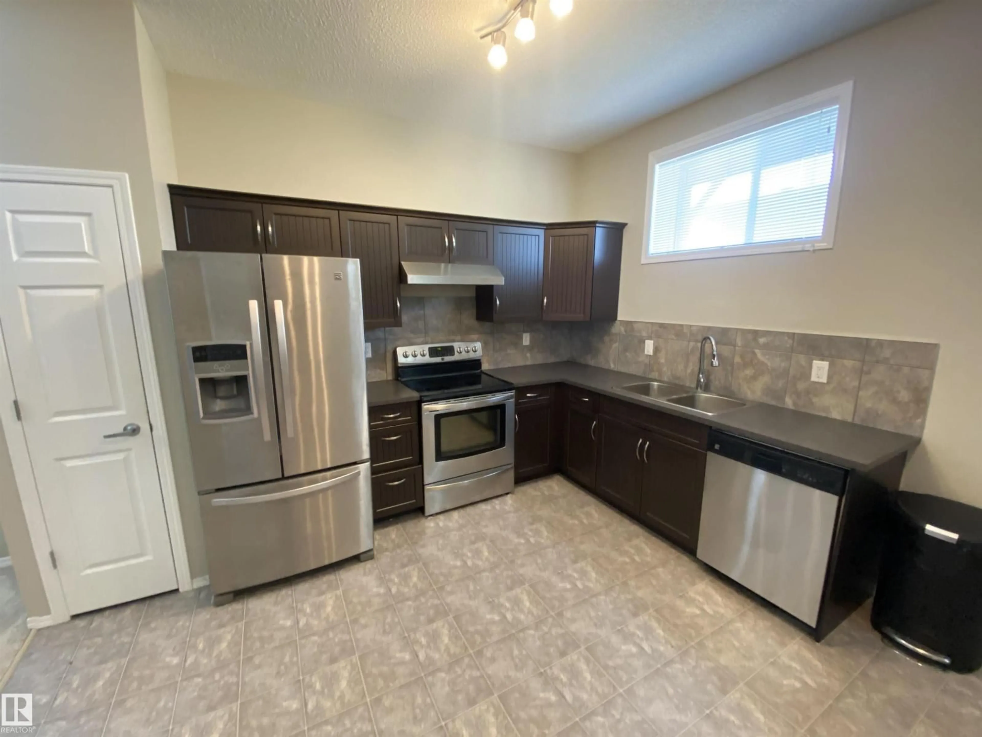 Standard kitchen, ceramic/tile floor for 142 - 154 SELKIRK PLACE, Leduc Alberta T9E0M9