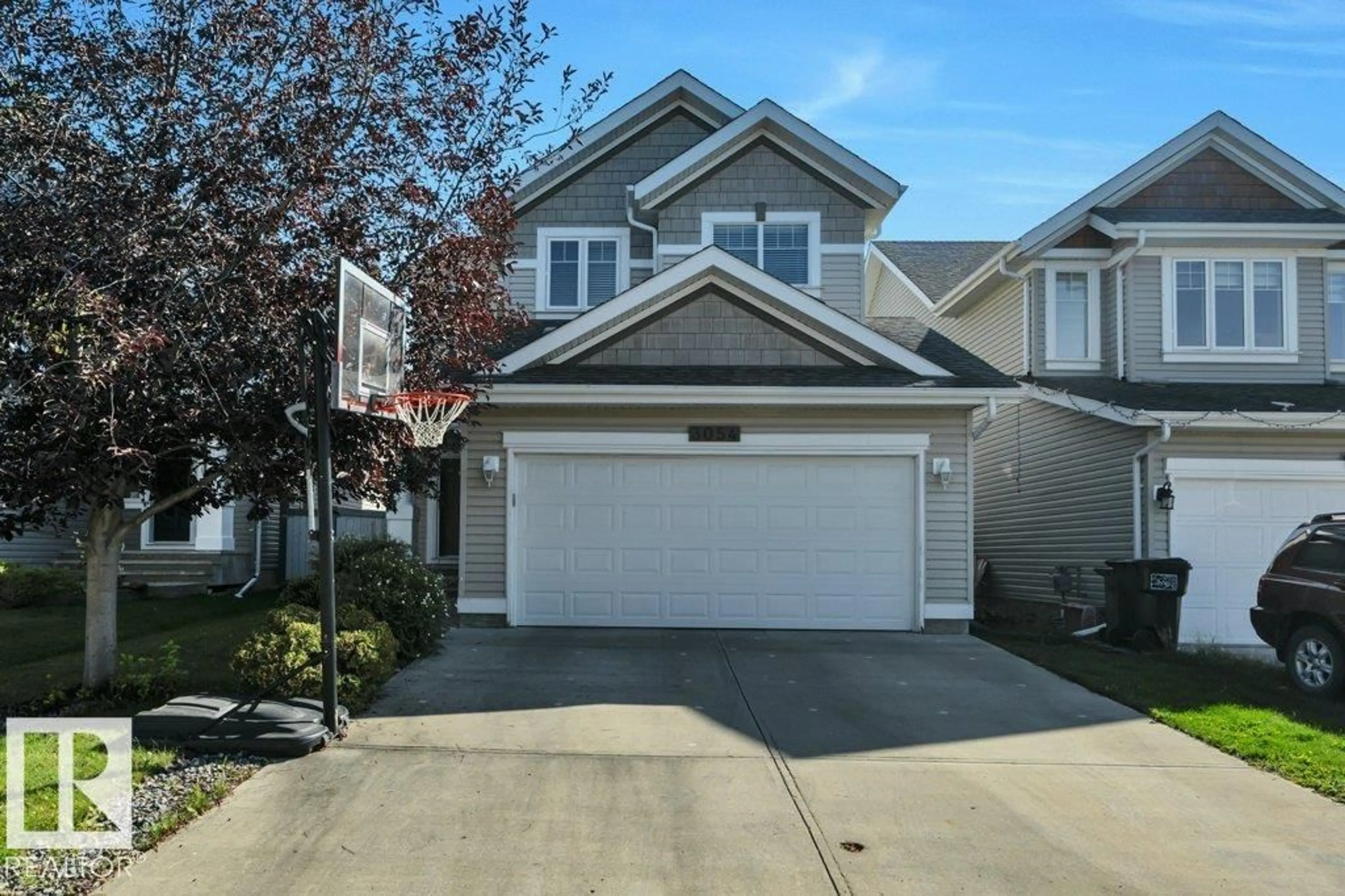 Home with vinyl exterior material, street for 3054 SPENCE WD, Edmonton Alberta T6X0A5
