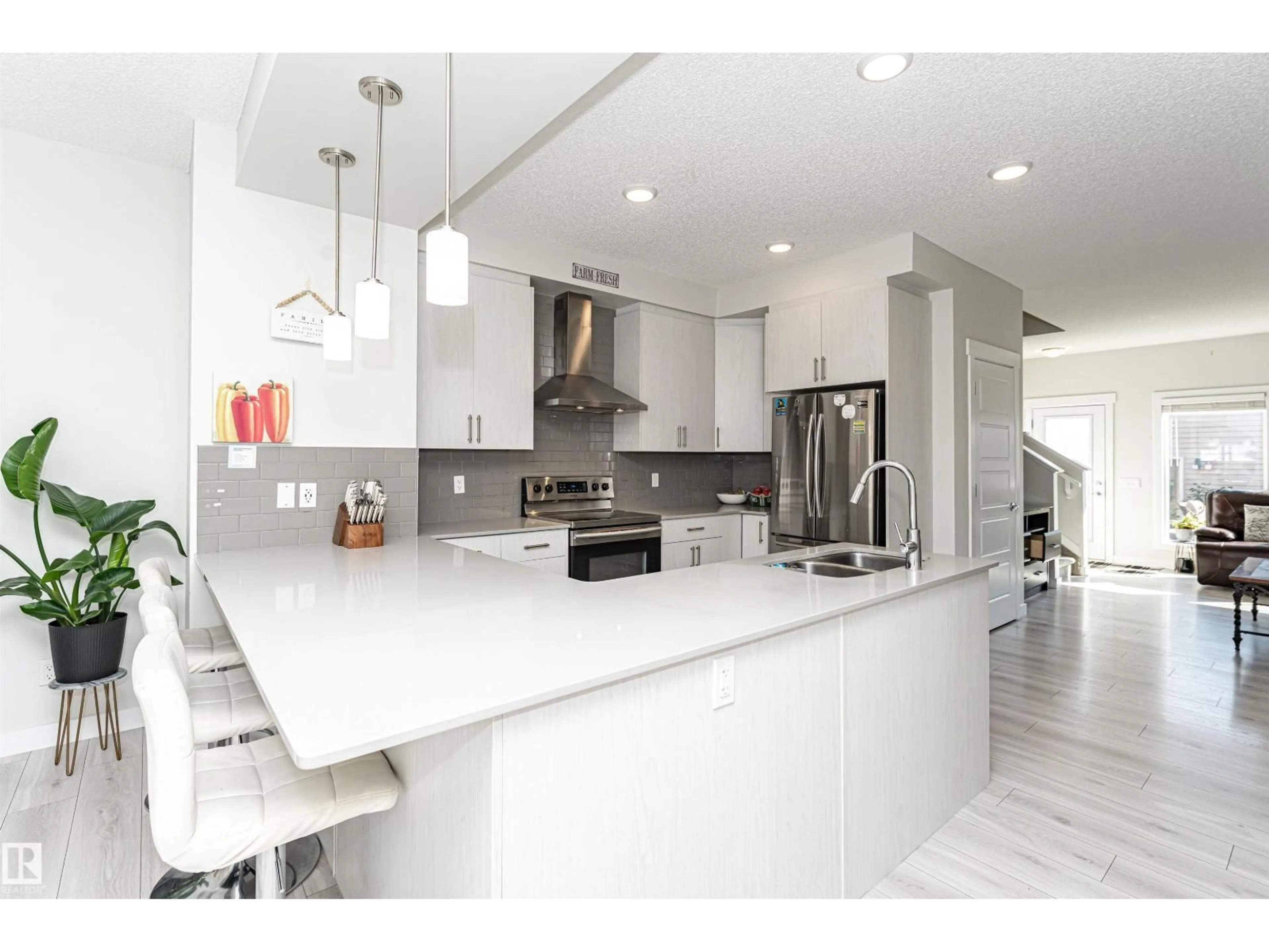 Contemporary kitchen, ceramic/tile floor for 636 ORCHARDS BV, Edmonton Alberta T6X2L4
