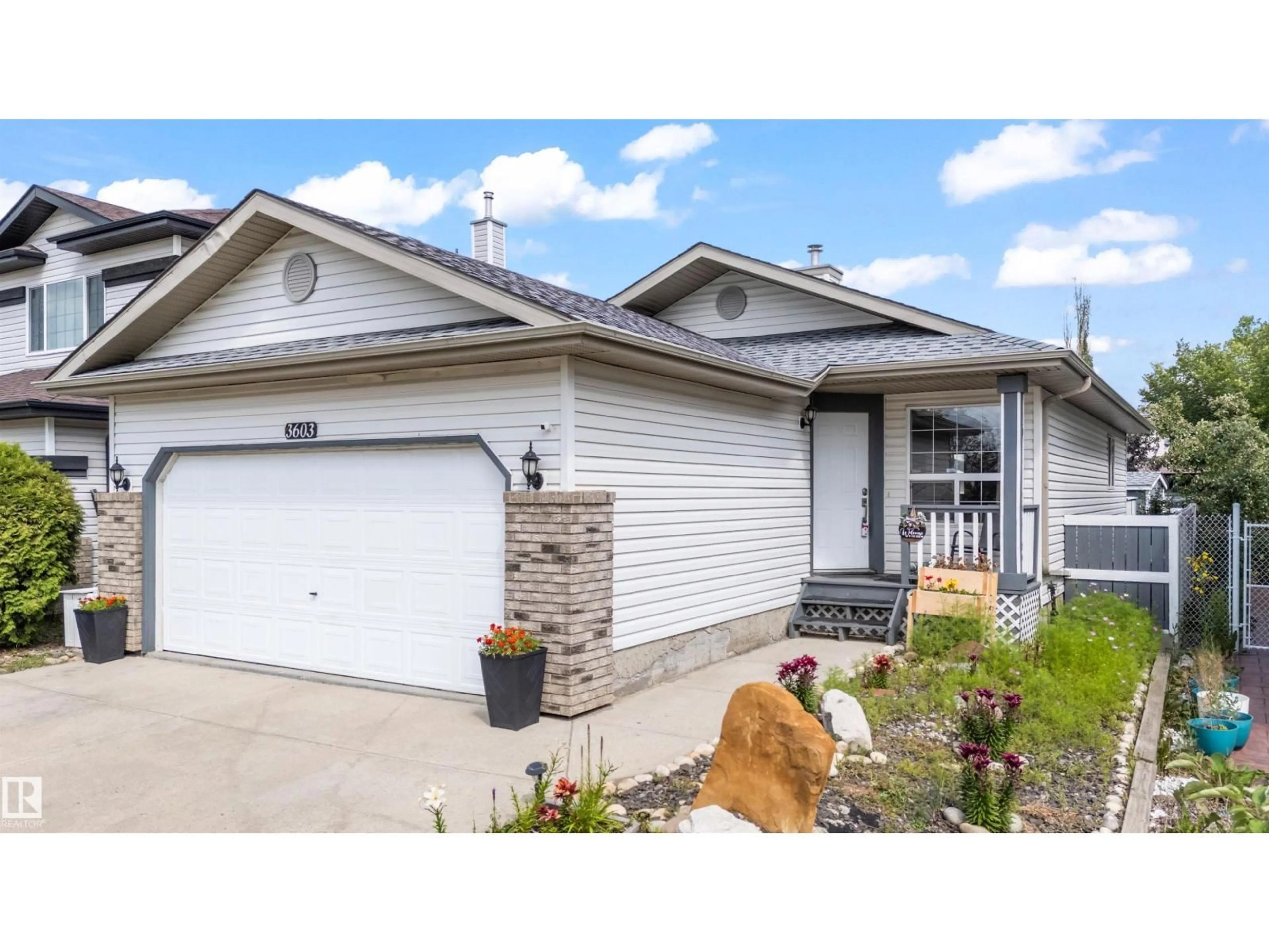 Home with vinyl exterior material, street for NW - 3603 23 ST, Edmonton Alberta T6T1W2