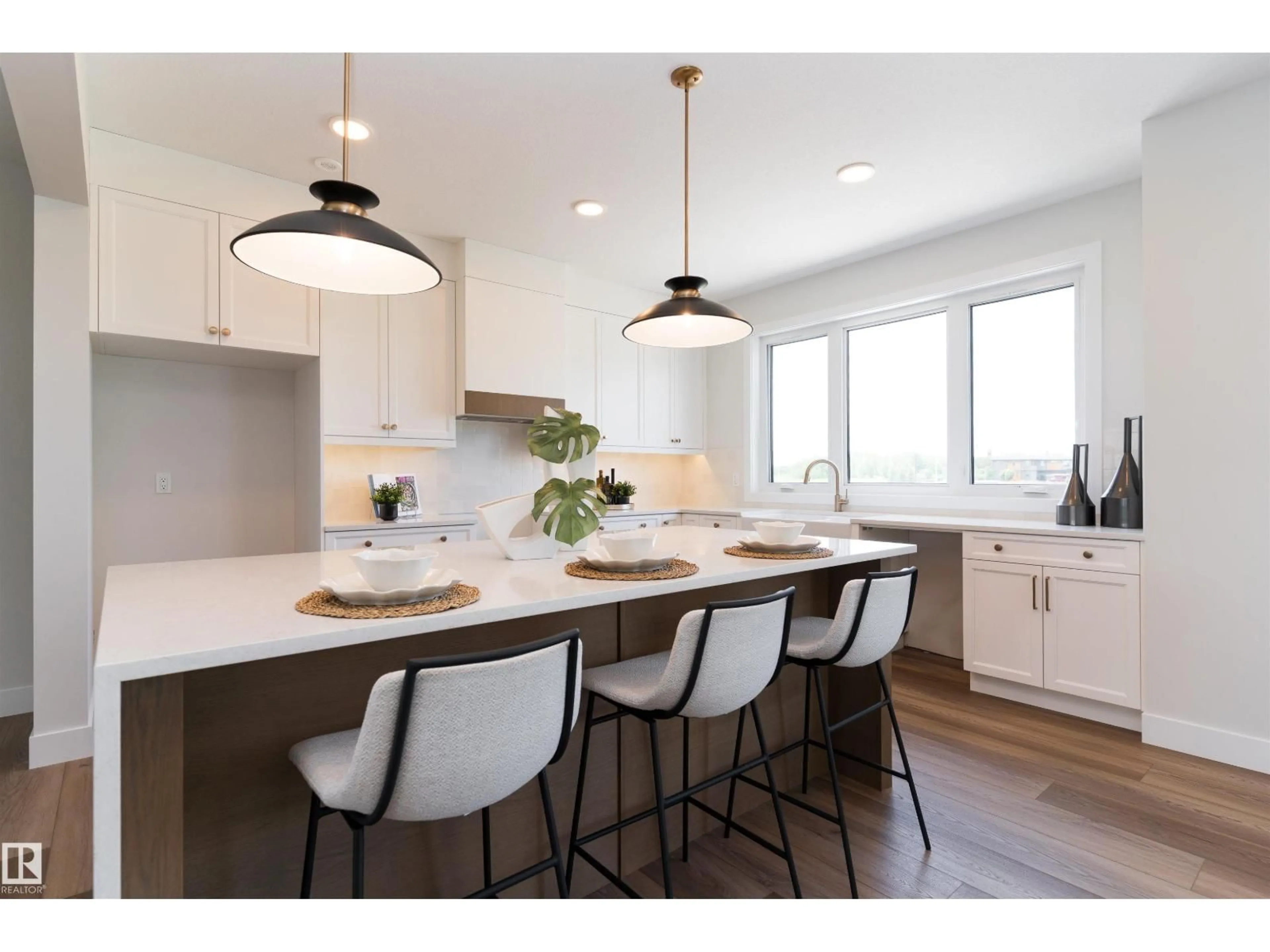Open concept kitchen, wood/laminate floor for #26 - 7121 MAY CR, Edmonton Alberta T6R0X2