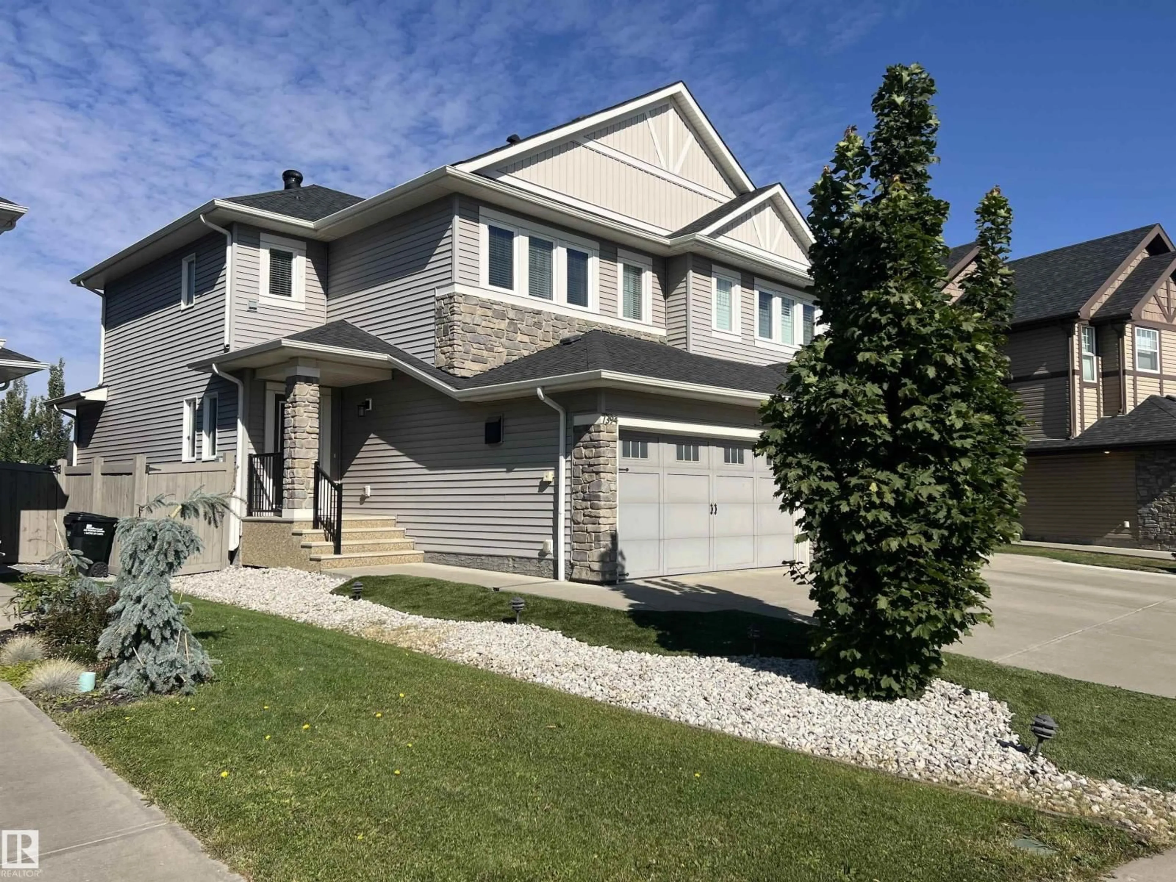 Home with vinyl exterior material, street for 7394 ESSEX RD, Sherwood Park Alberta T8H0X2