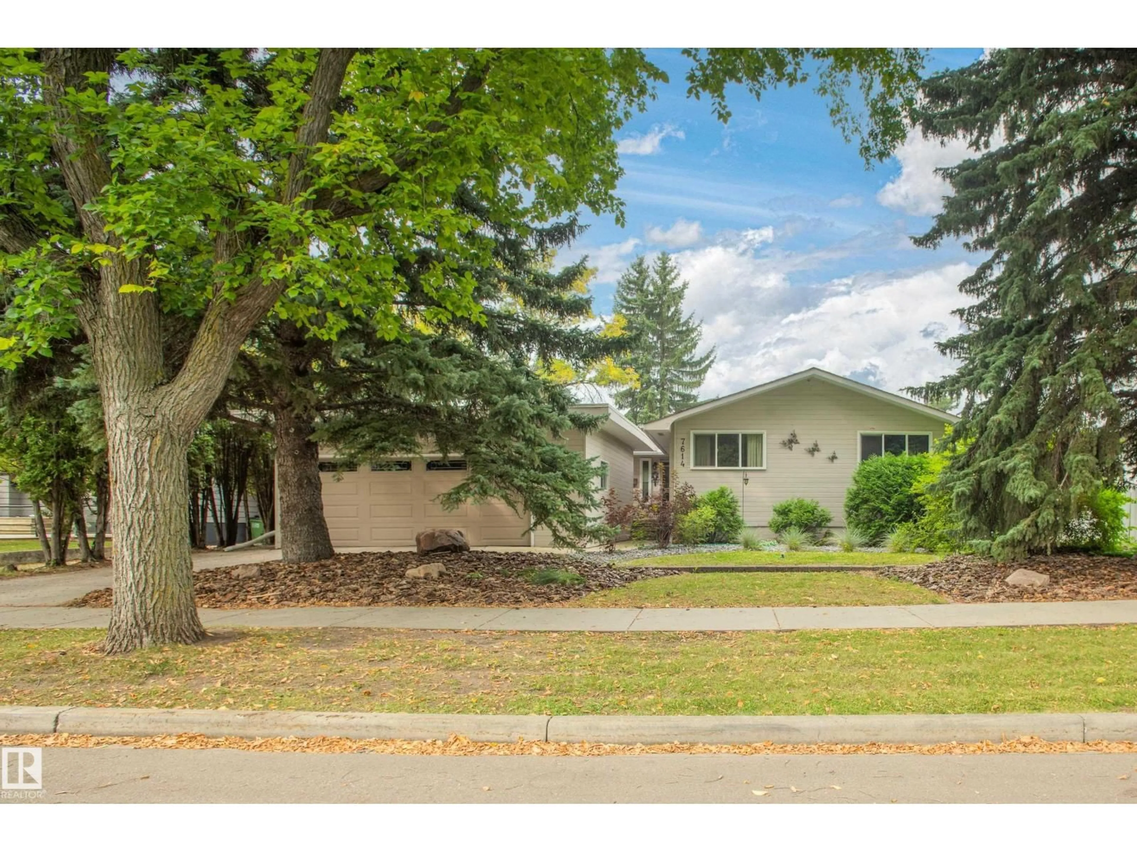 Home with vinyl exterior material, street for NW - 7614 149 ST, Edmonton Alberta T5R1A7