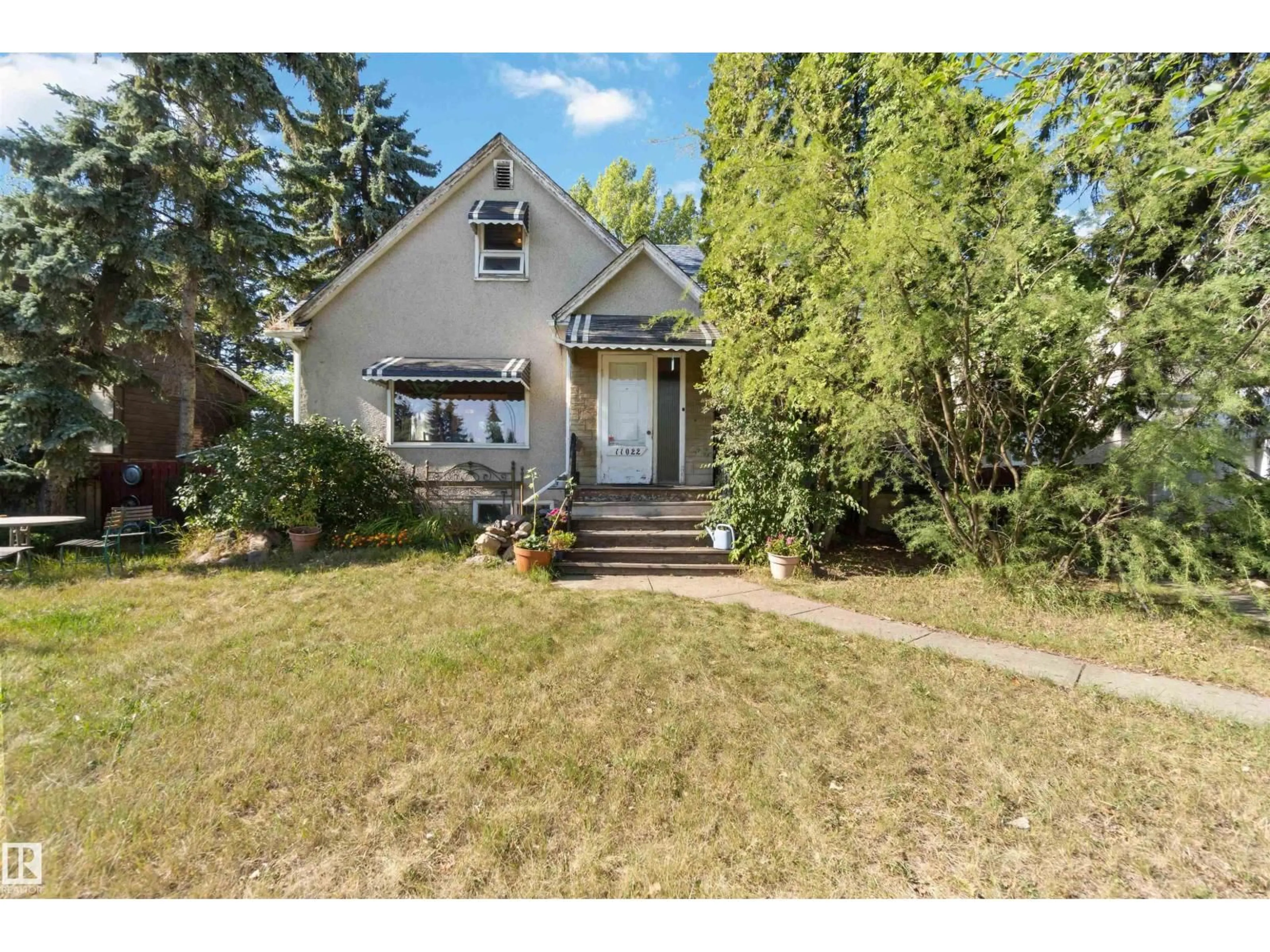 A pic from outside/outdoor area/front of a property/back of a property/a pic from drone, street for 11022 110 AV, Edmonton Alberta T5H1H9