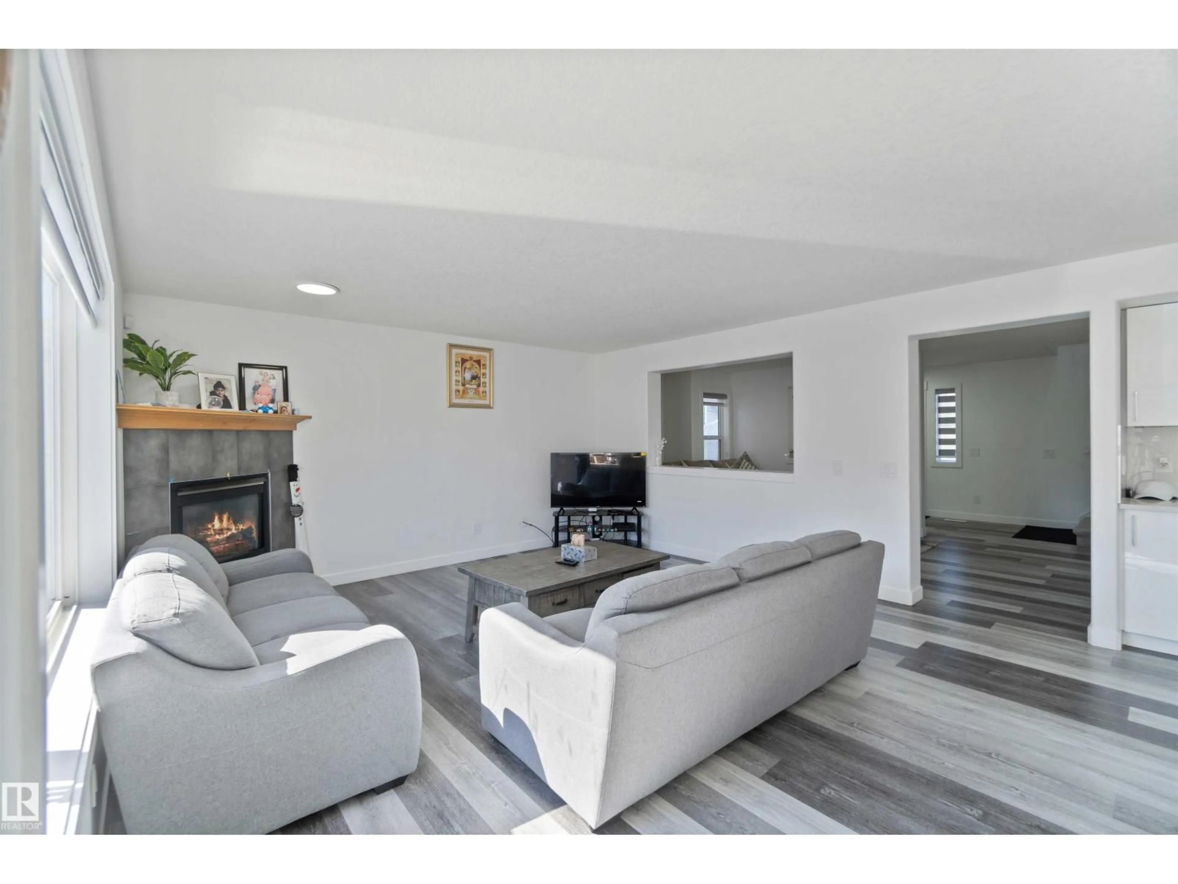 Living room with furniture, unknown for 1017 82 ST, Edmonton Alberta T6X1E4