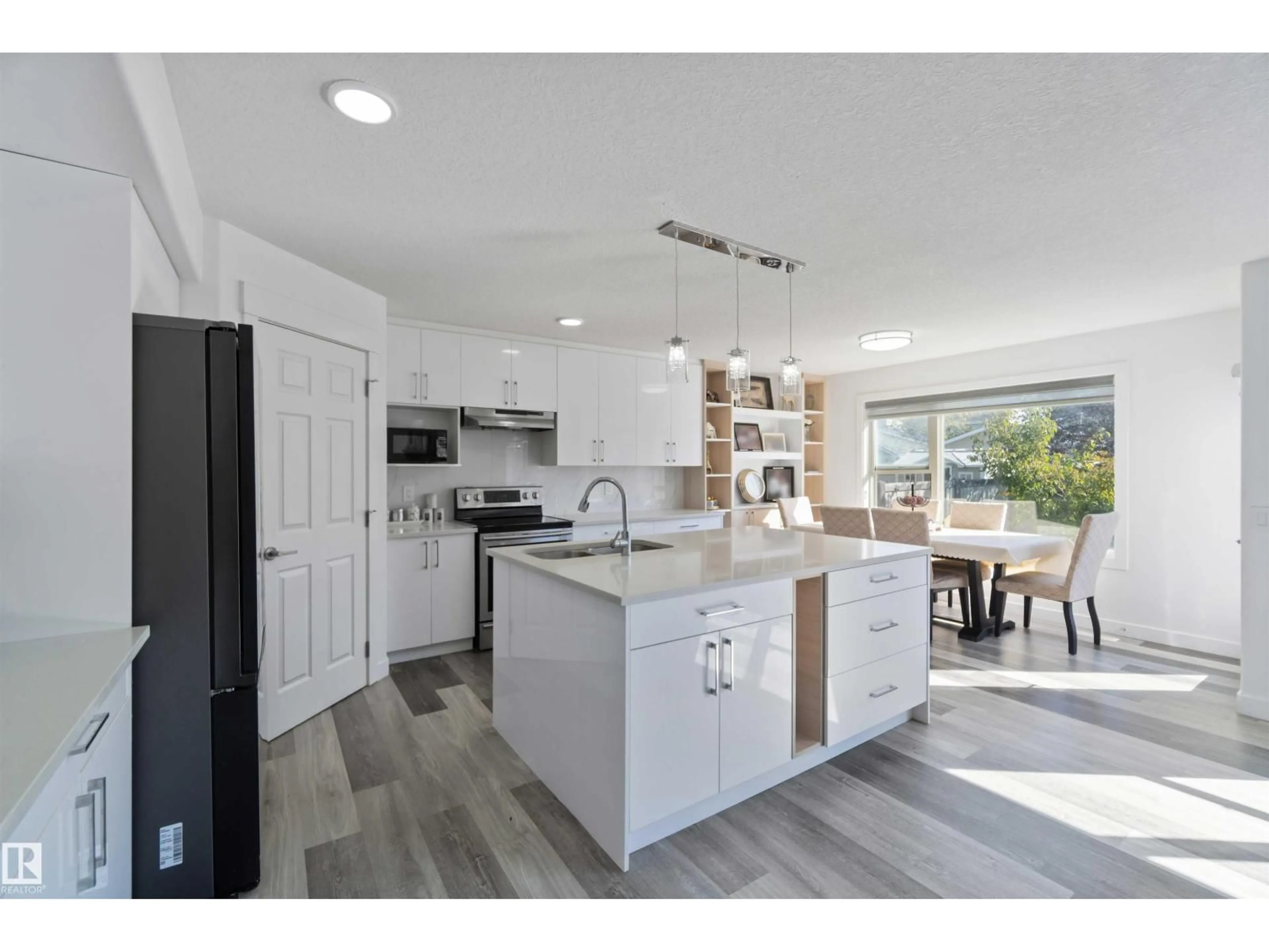 Open concept kitchen, unknown for 1017 82 ST, Edmonton Alberta T6X1E4