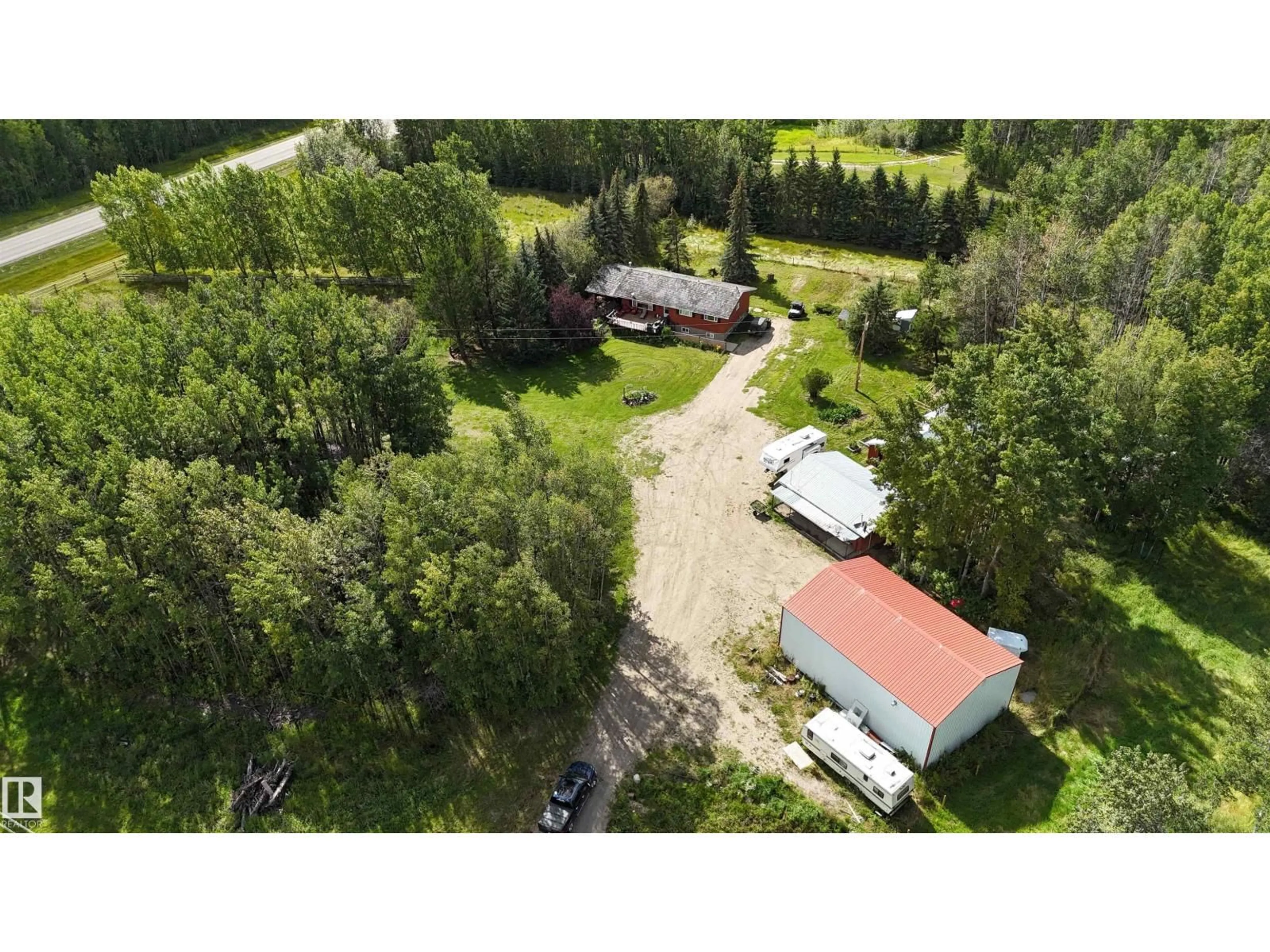A pic from outside/outdoor area/front of a property/back of a property/a pic from drone, unknown for 7304 HWY 624, Rural Parkland County Alberta T7A1S7