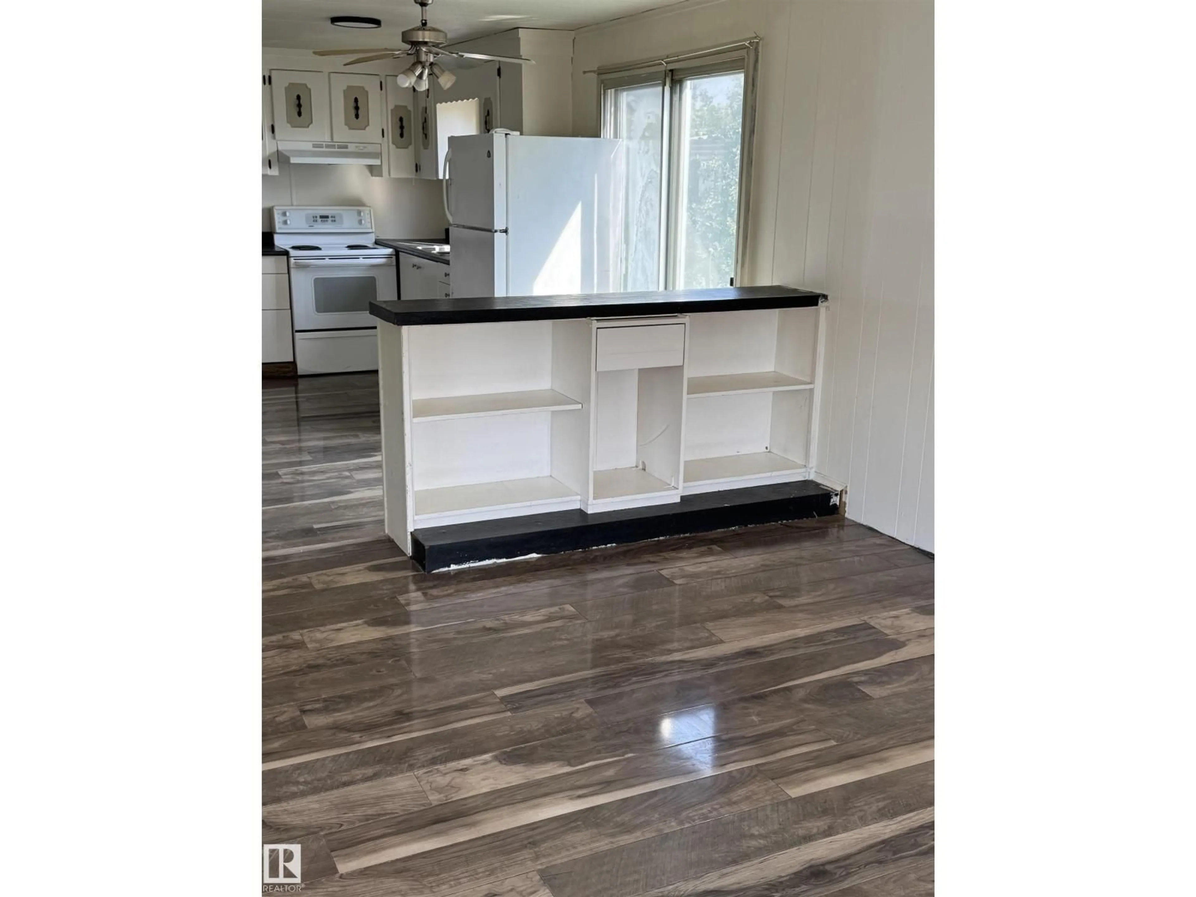 Open concept kitchen, ceramic/tile floor for 4802 - 67 54 AV, Camrose Alberta T4V3A5