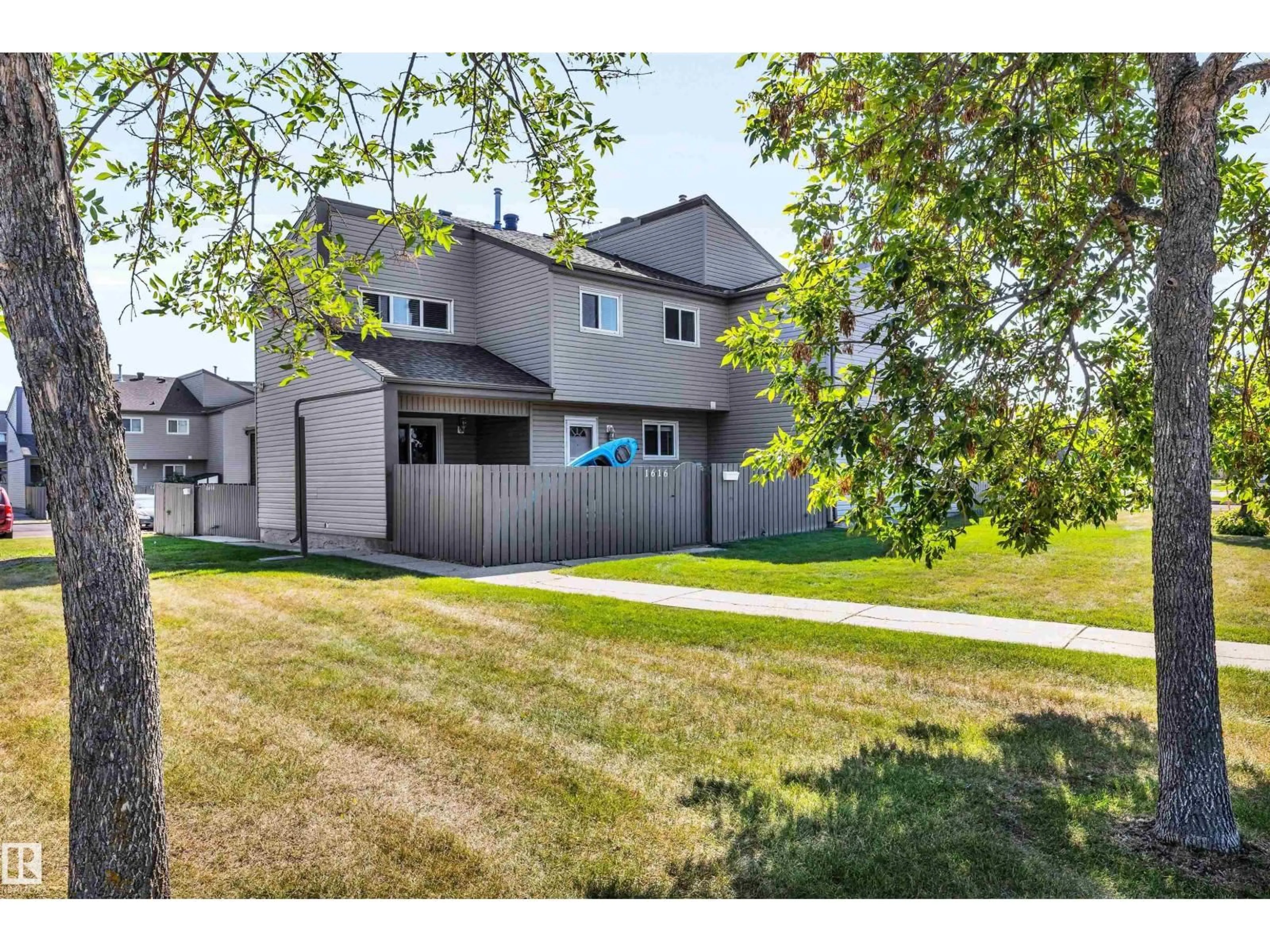 Home with vinyl exterior material, street for 1616 LAKEWOOD RD, Edmonton Alberta T6K3H4