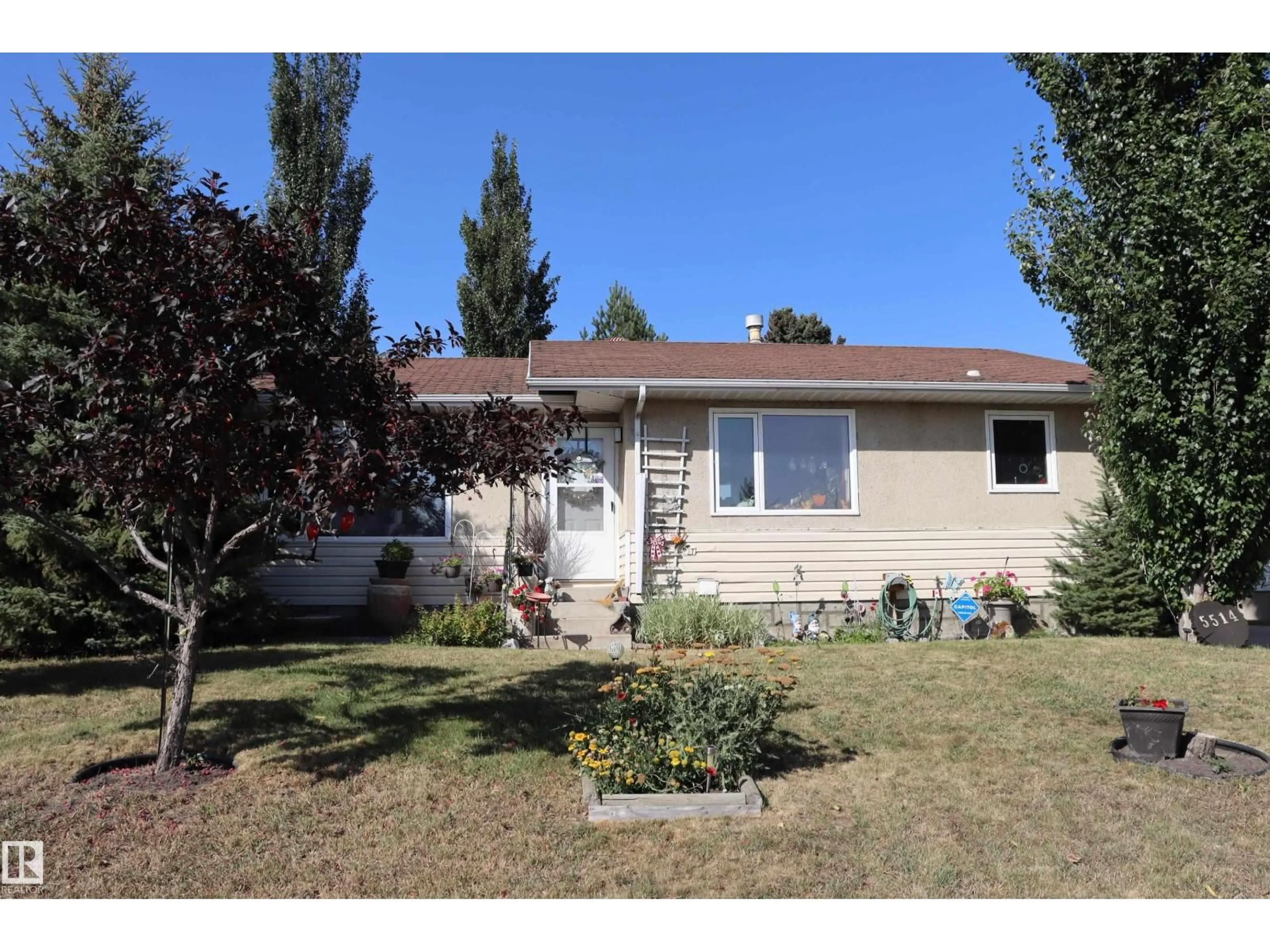 Home with vinyl exterior material, street for 5514 44 AVE, Wetaskiwin Alberta T9A0C9