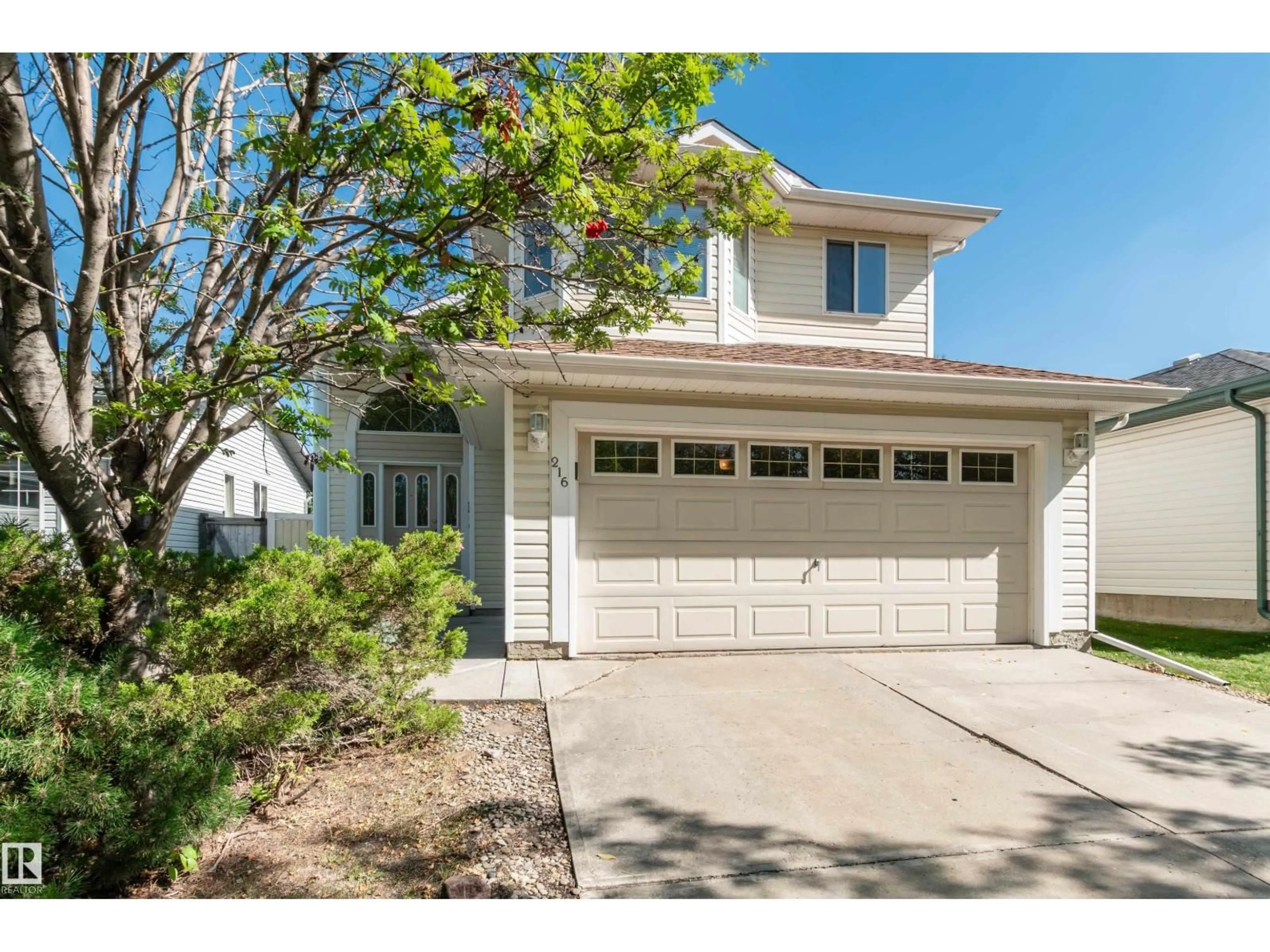 Home with vinyl exterior material, street for 216 RAINBOW CR, Sherwood Park Alberta T8A5Y1
