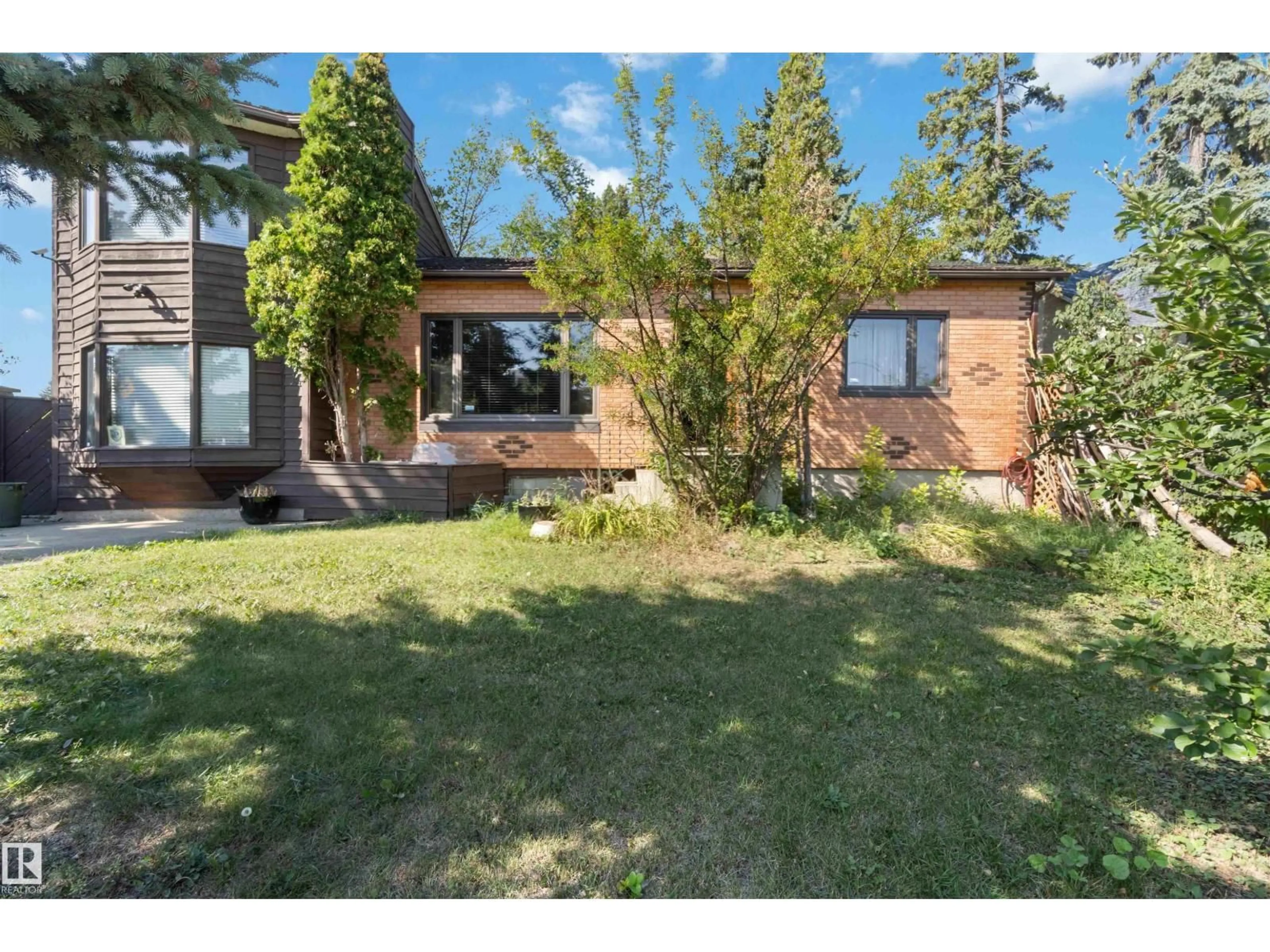 A pic from outside/outdoor area/front of a property/back of a property/a pic from drone, street for 11026 110 AV, Edmonton Alberta T5H1H9