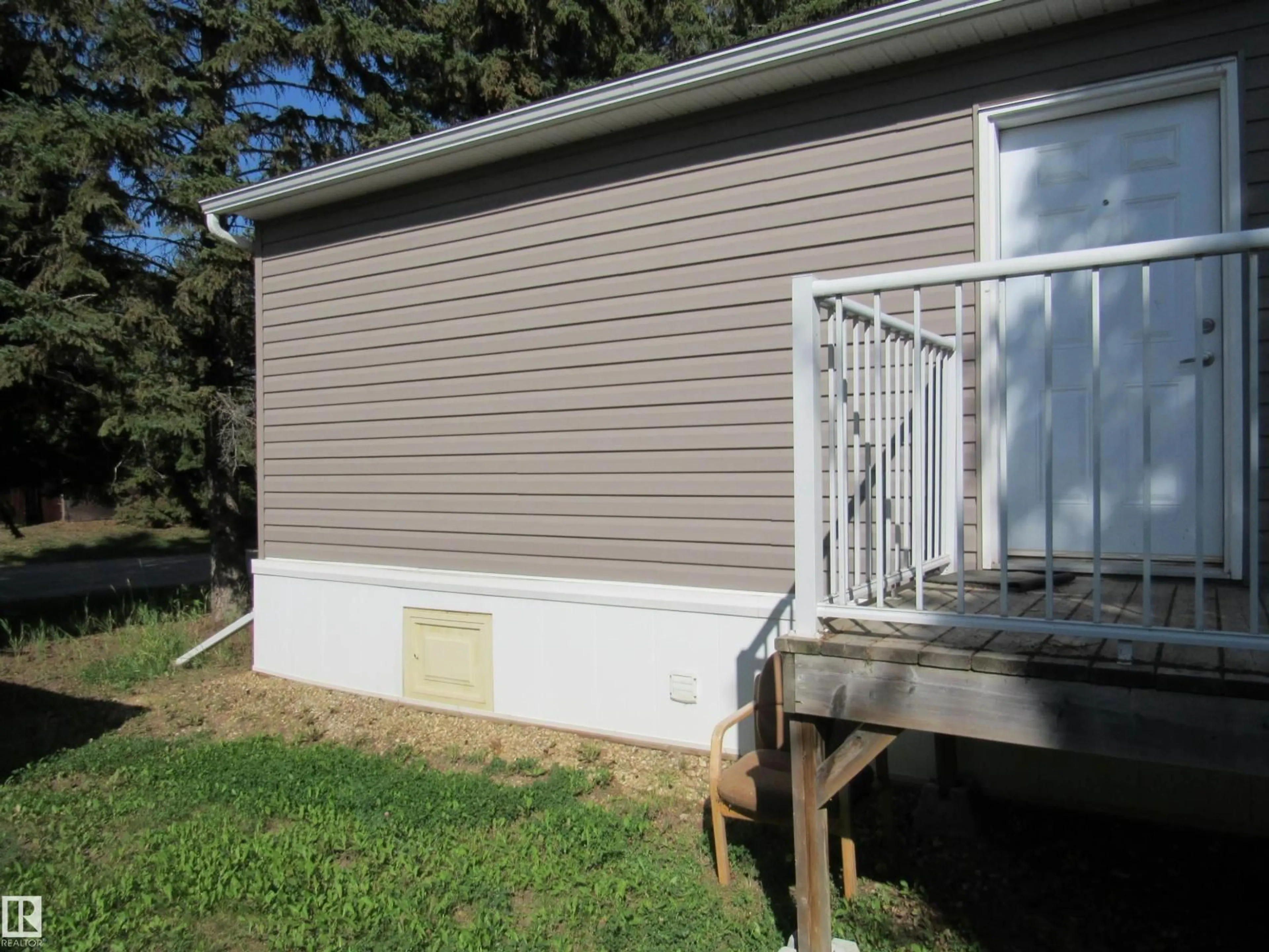 Home with vinyl exterior material, building for 3A - 4515 50 AVE, Barrhead Alberta T7N1J6