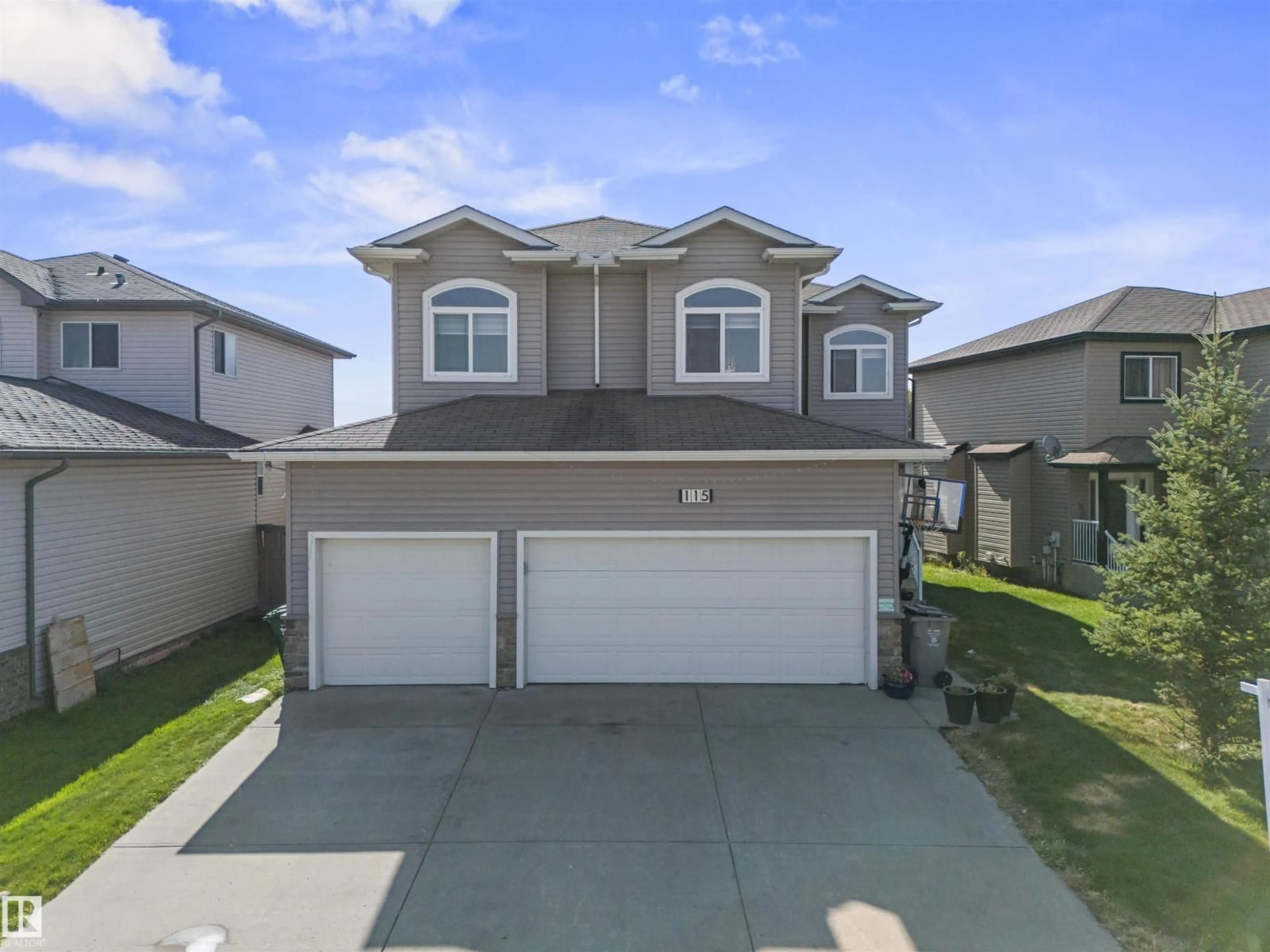 A pic from outside/outdoor area/front of a property/back of a property/a pic from drone, street for 115 LAKELAND DR, Beaumont Alberta T4X0B4