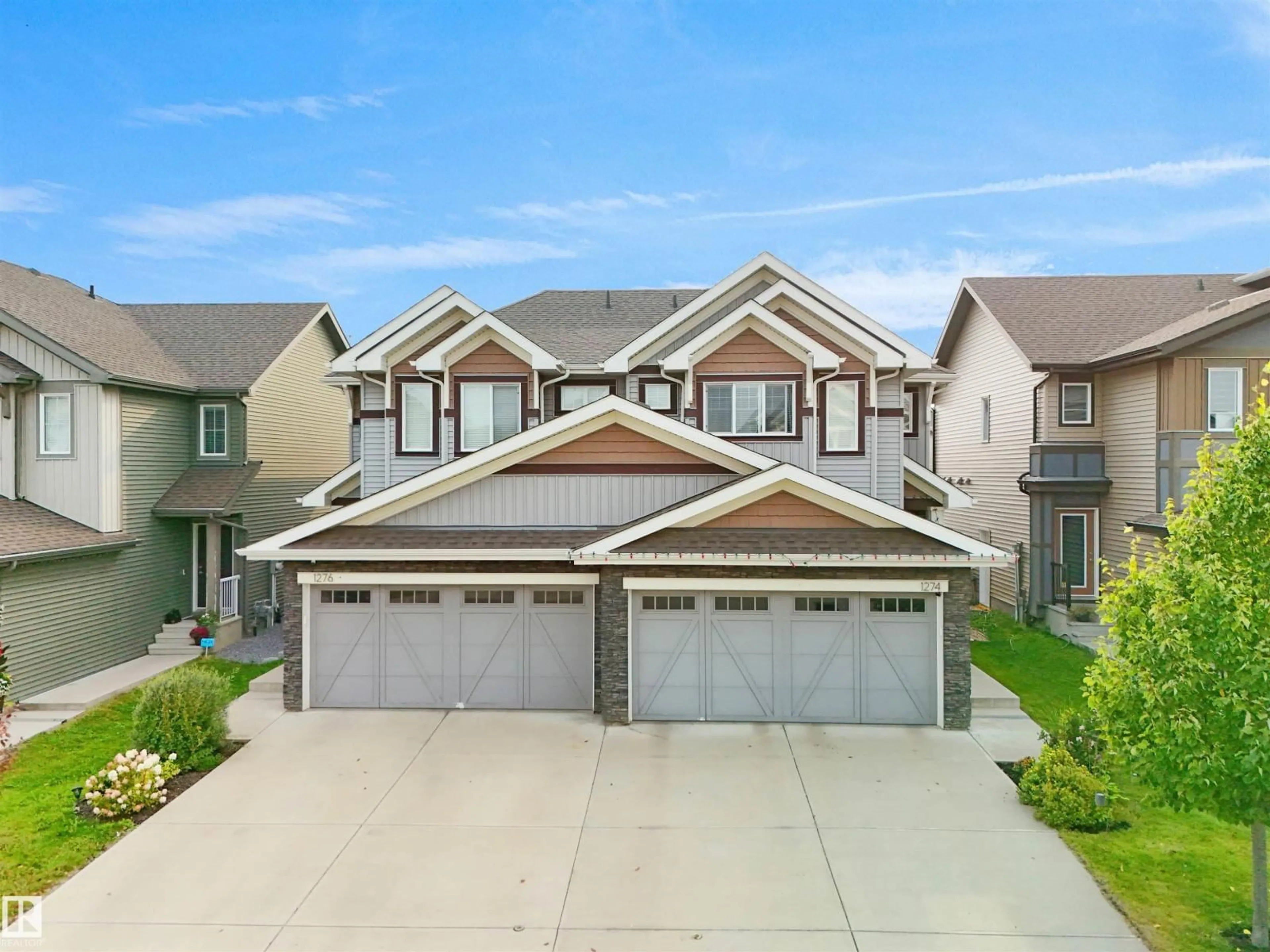 A pic from outside/outdoor area/front of a property/back of a property/a pic from drone, street for 1274 DANIELS CR, Edmonton Alberta T6W3J1