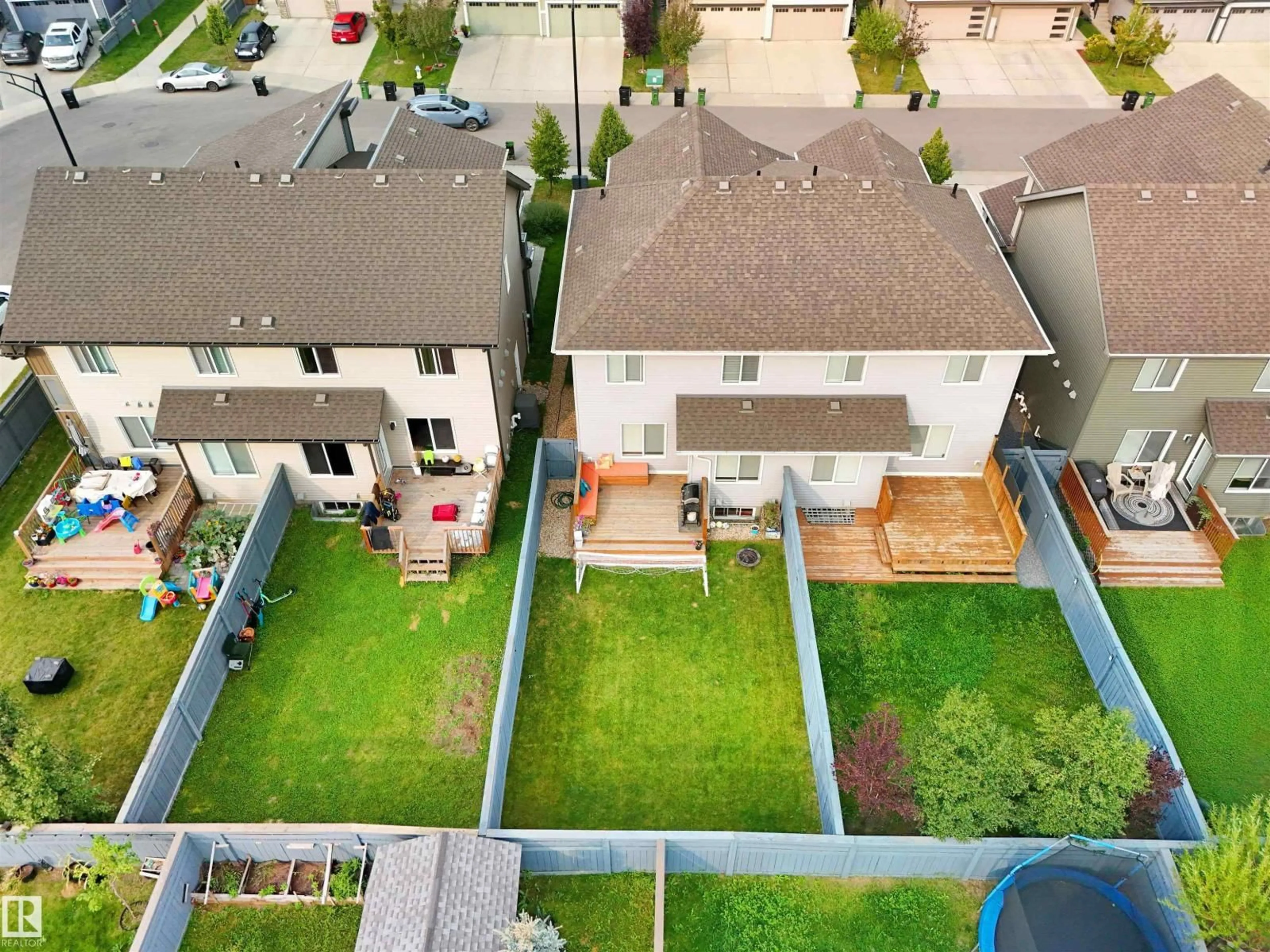 A pic from outside/outdoor area/front of a property/back of a property/a pic from drone, street for 1274 DANIELS CR, Edmonton Alberta T6W3J1