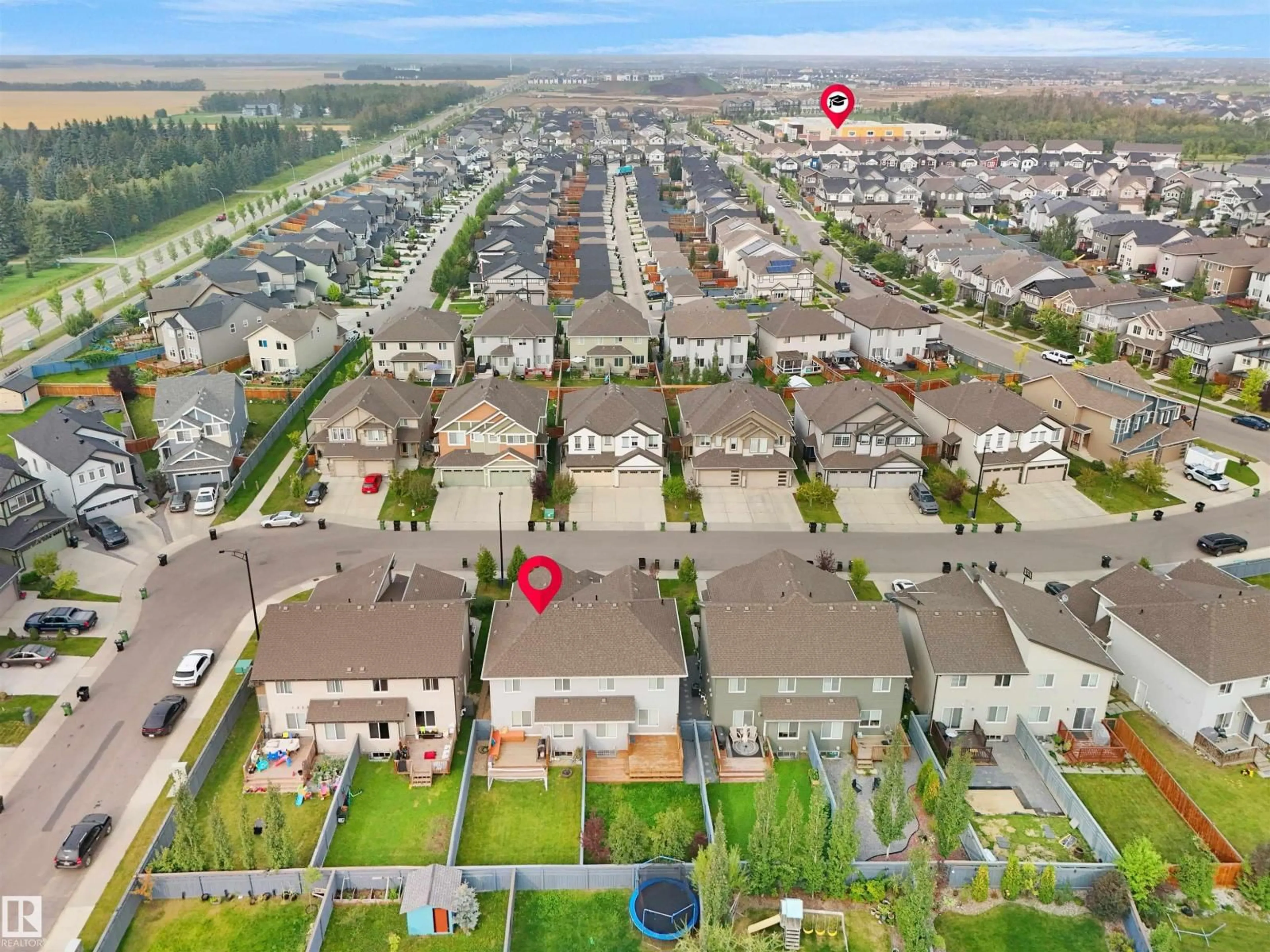 A pic from outside/outdoor area/front of a property/back of a property/a pic from drone, street for 1274 DANIELS CR, Edmonton Alberta T6W3J1