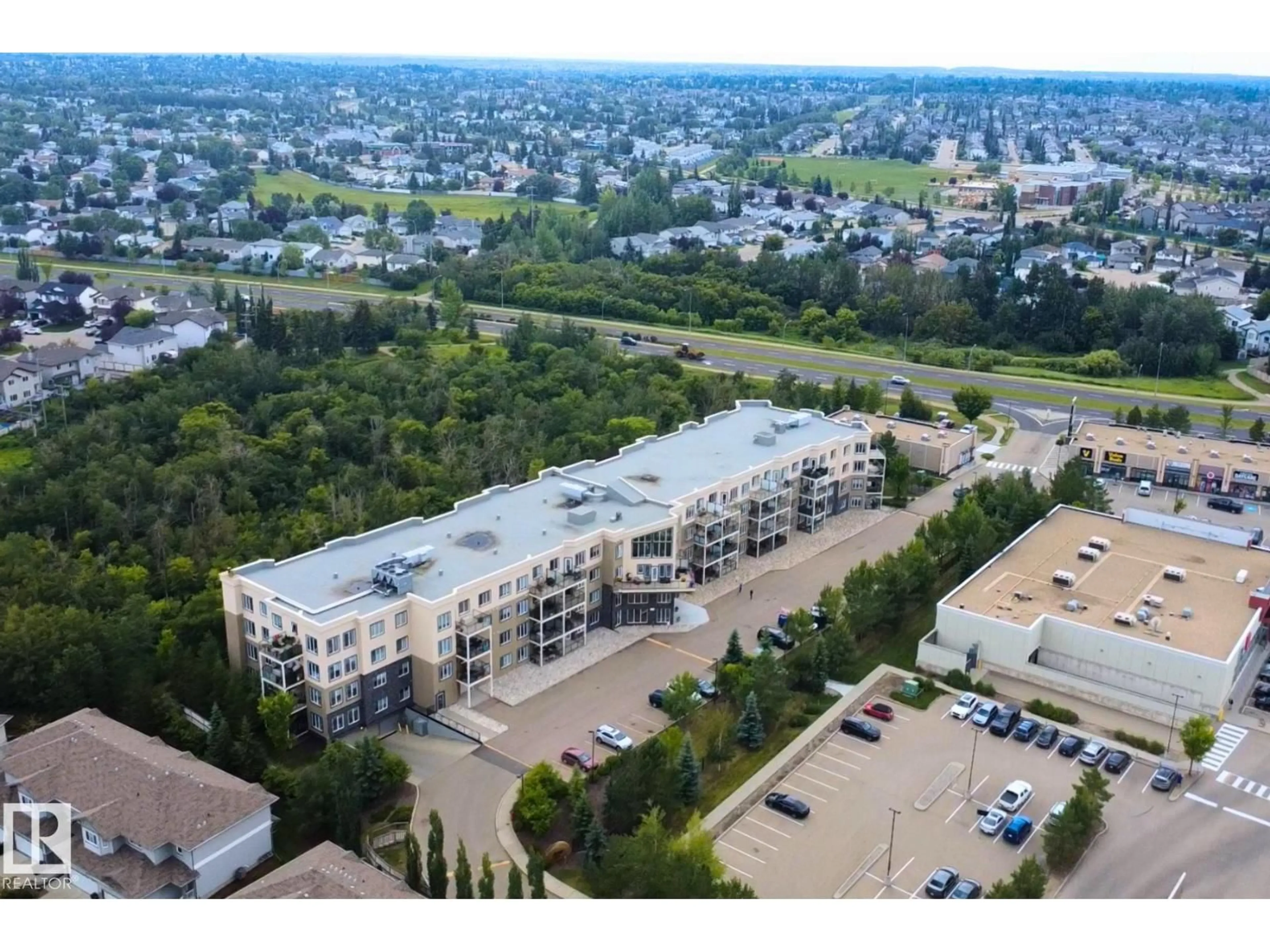 A pic from outside/outdoor area/front of a property/back of a property/a pic from drone, unknown for #205 - 4075 CLOVER BAR RD, Sherwood Park Alberta T8H0R6
