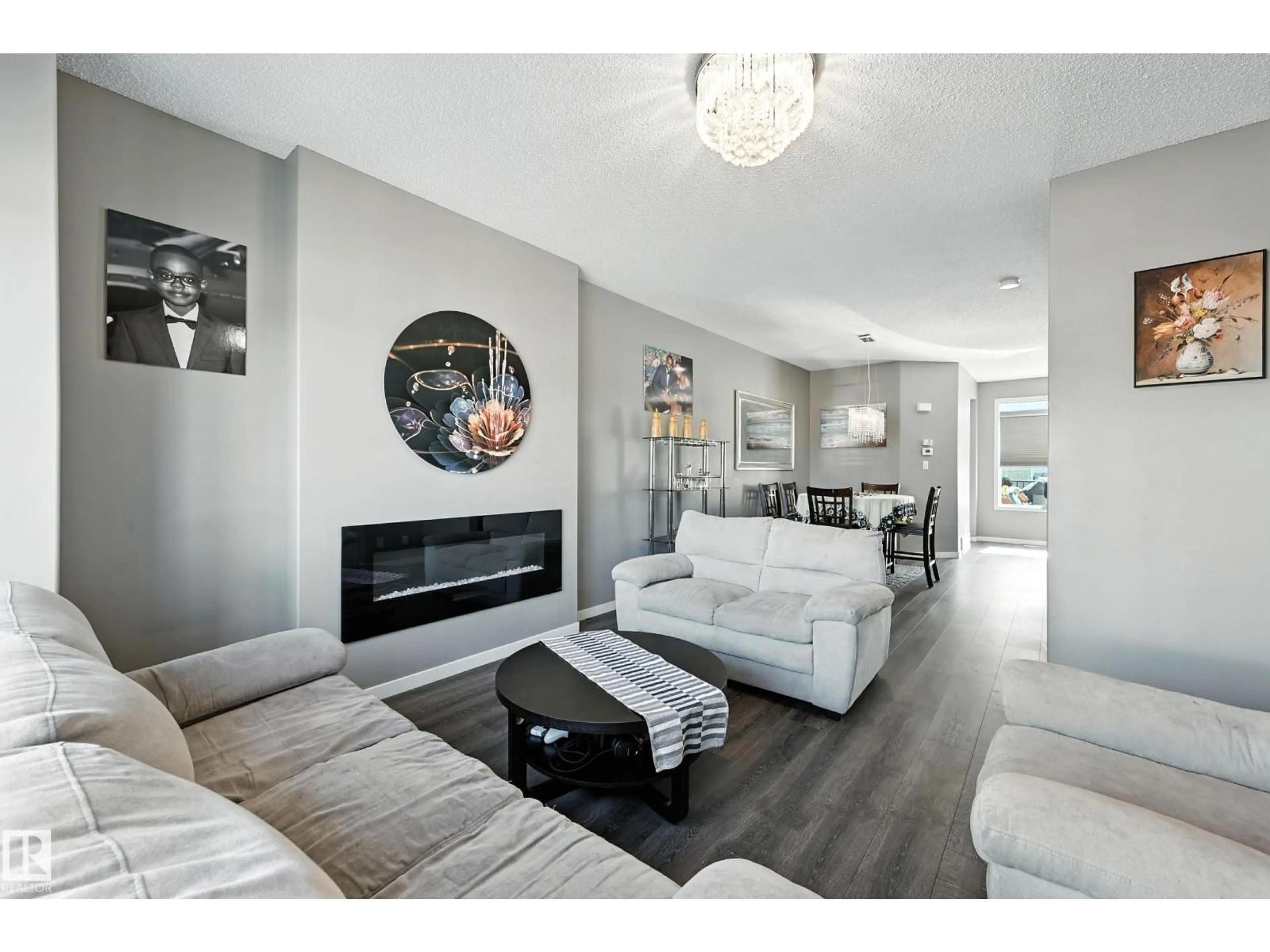 Living room with furniture, unknown for 6321 170 AV, Edmonton Alberta T5Y3X7