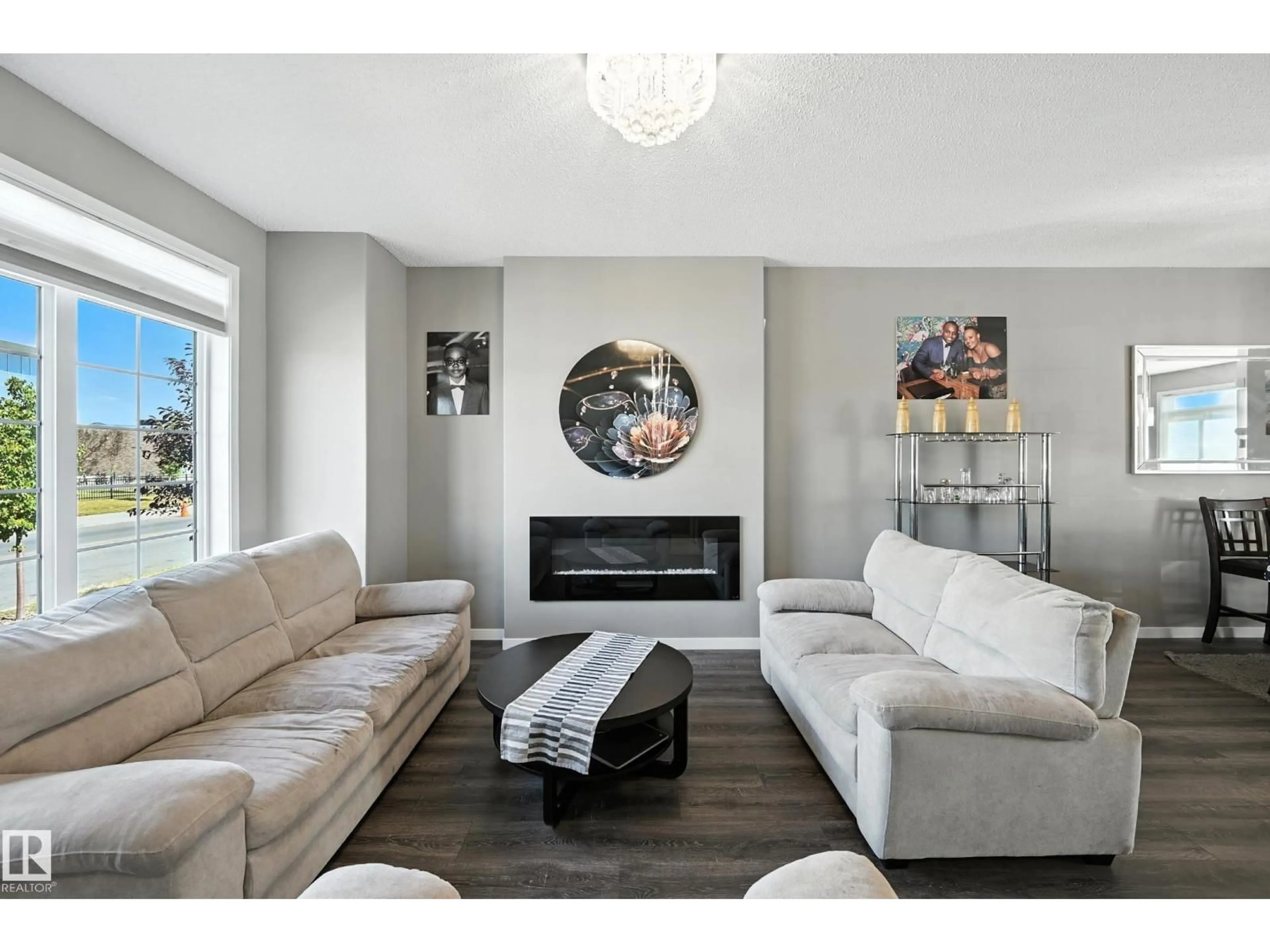 Living room with furniture, unknown for 6321 170 AV, Edmonton Alberta T5Y3X7