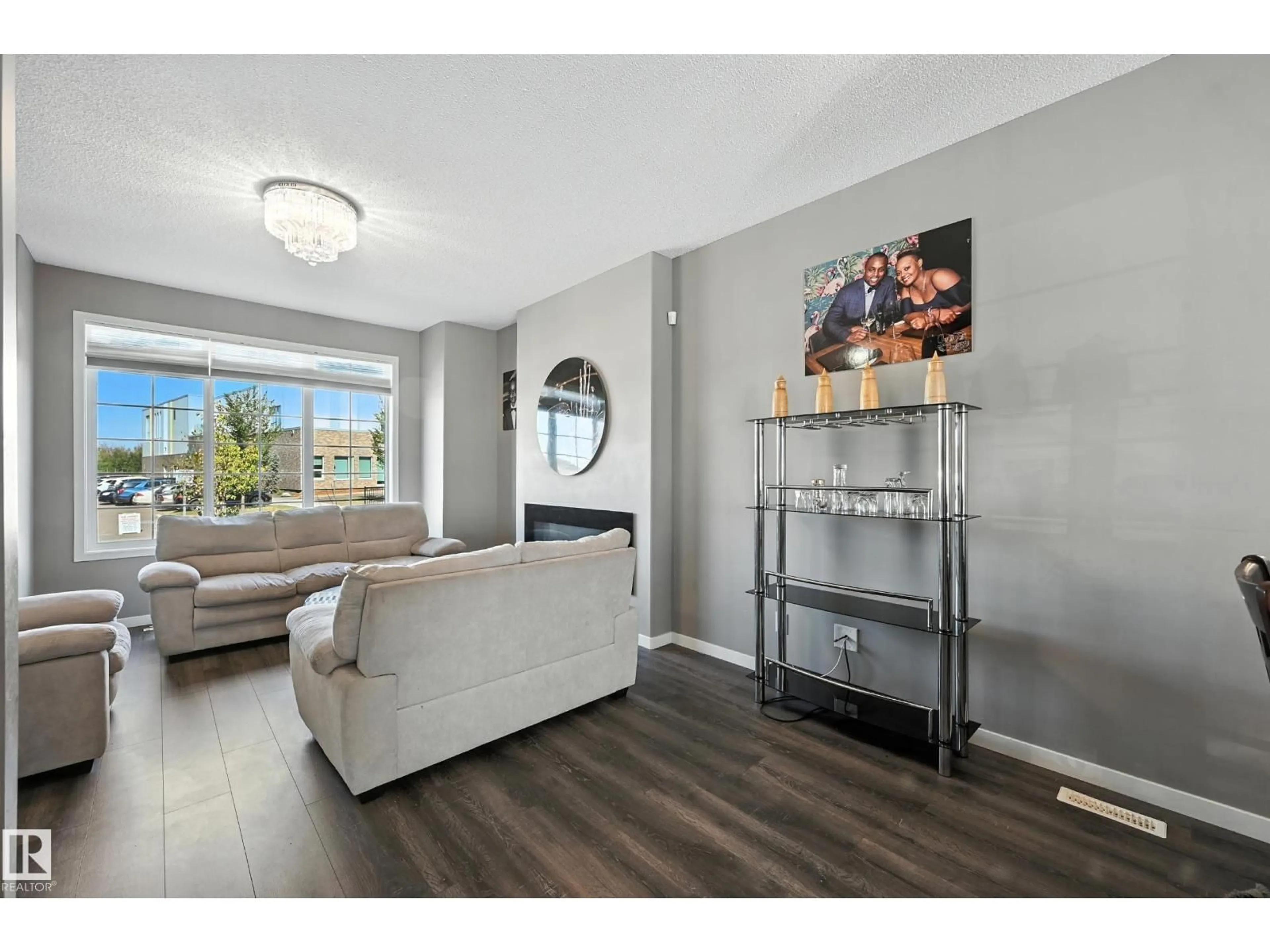 Living room with furniture, unknown for 6321 170 AV, Edmonton Alberta T5Y3X7